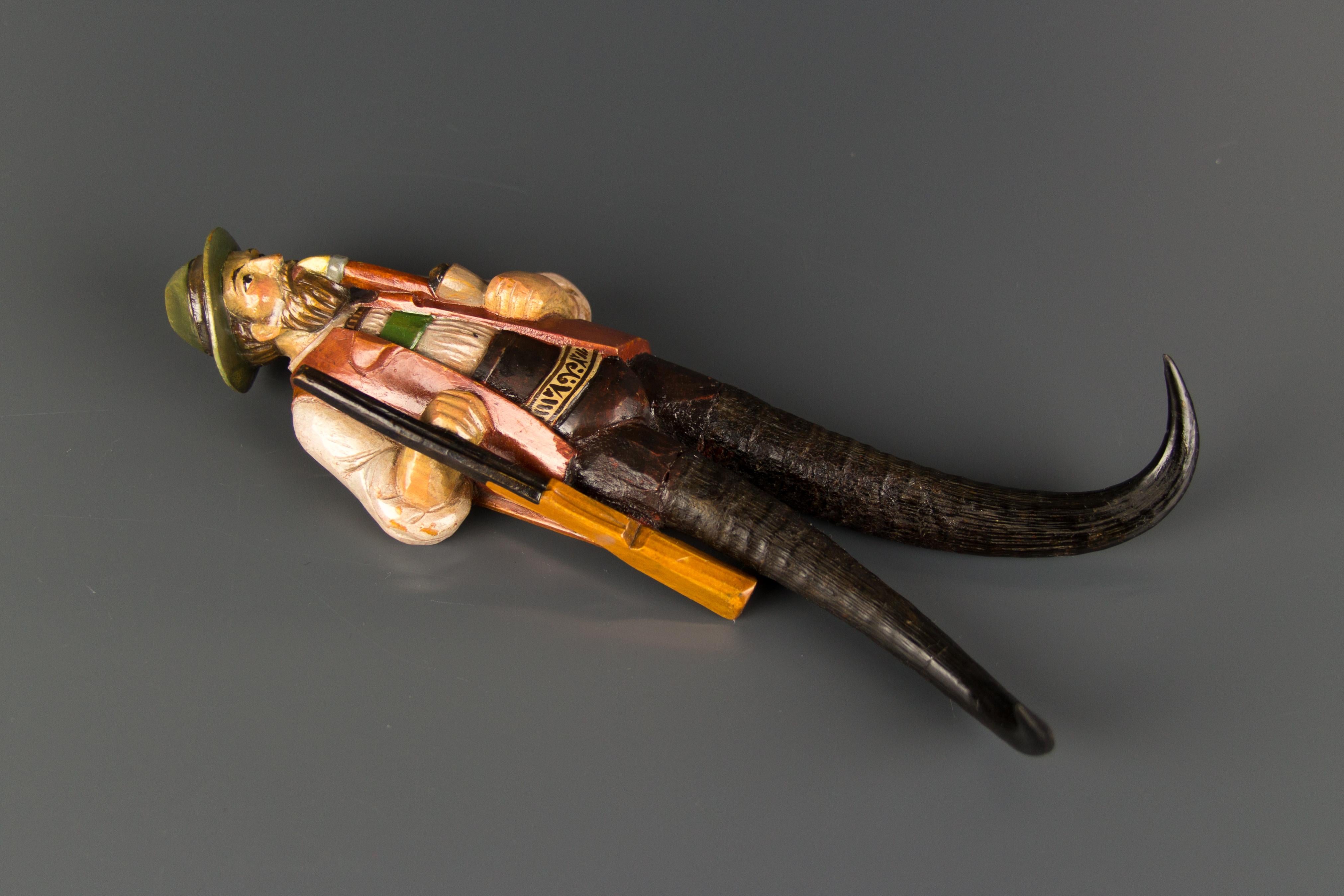 Early 20th Century Antique Hand Carved and Painted Hunter Figure Whip Holder or Hanger, 1900s