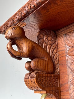 Antique Hand Carved Arts and Crafts Wall Coat Rack with Squirrel Sculptures