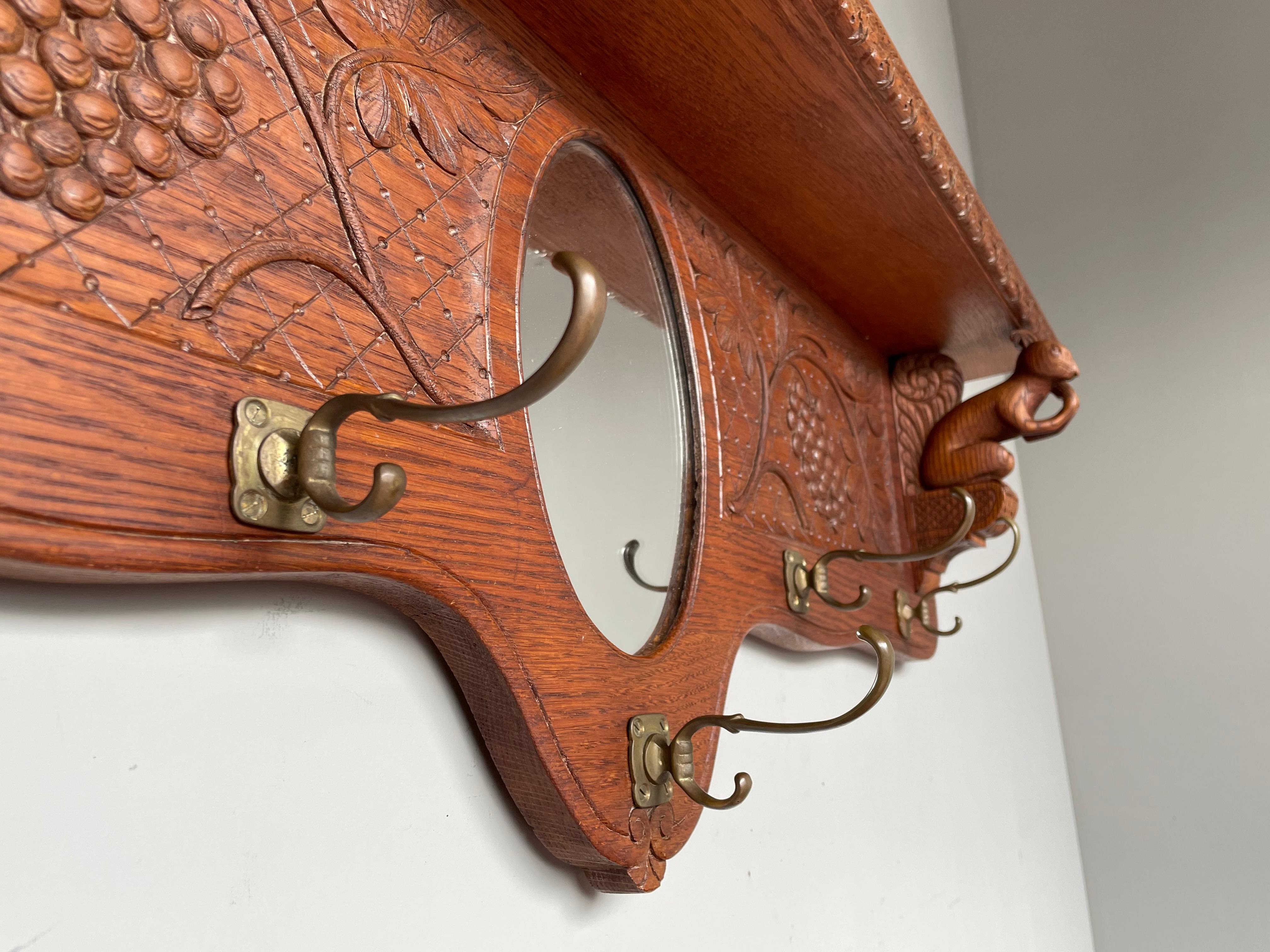 Antique Hand Carved Arts and Crafts Wall Coat Rack with Squirrel Sculptures In Excellent Condition In Lisse, NL