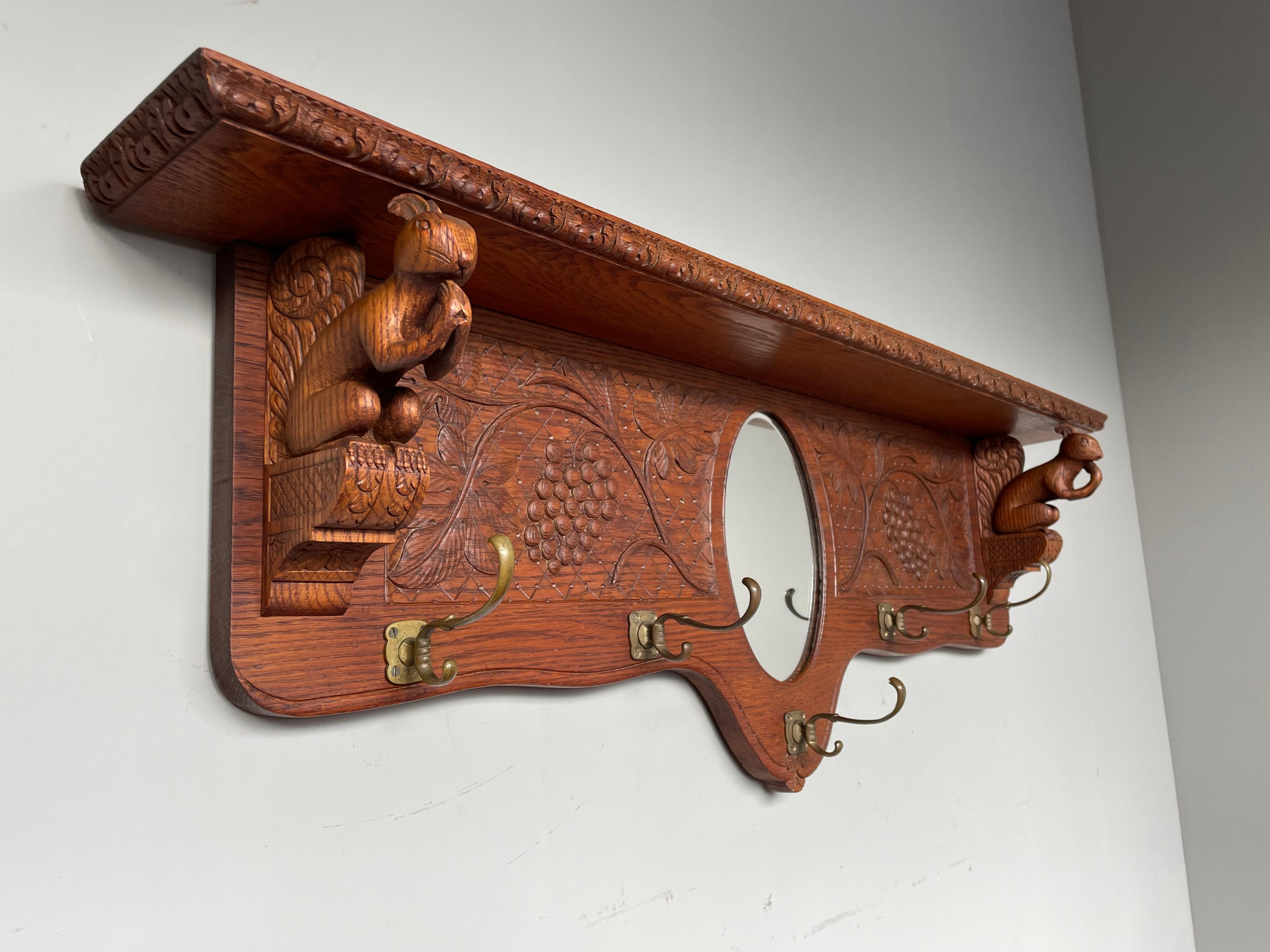 20th Century Antique Hand Carved Arts and Crafts Wall Coat Rack with Squirrel Sculptures