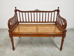 Antique hand-carved Bench done in style of Louis XVI with hand-woven cane seat