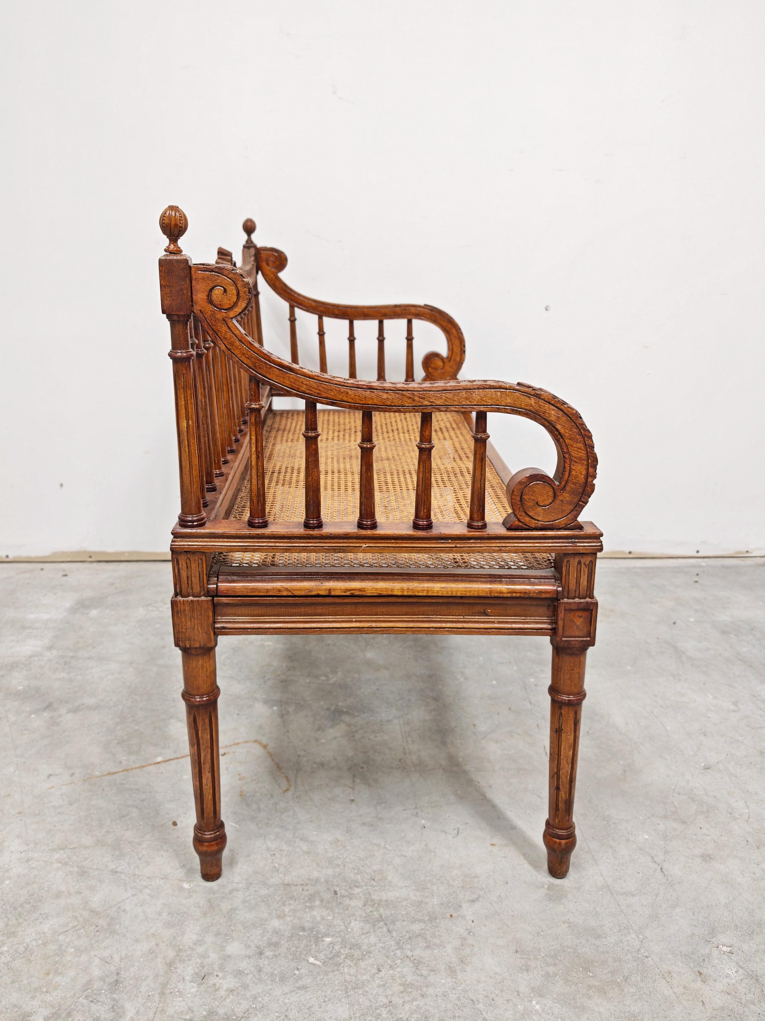 Late 19th Century Antique hand-carved Bench done in style of Louis XVI with hand-woven cane seat For Sale