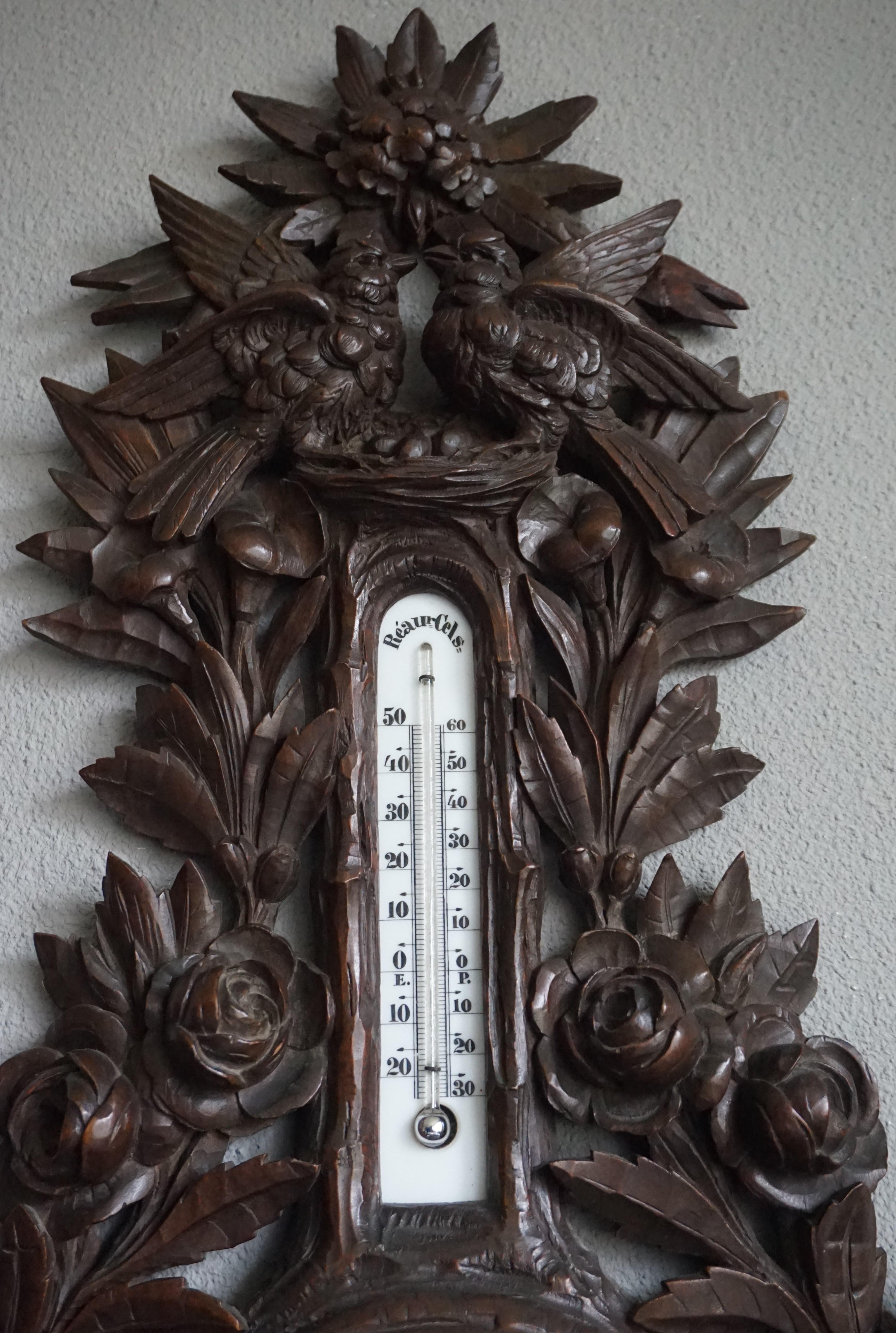Large and wonderful, Swiss Black Forest barometer with thermometer.

This mother nature inspired, charming and beautifully hand-carved barometer displays the quality of the craftsmanship of Swiss Black Forest artisans around the turn of the century