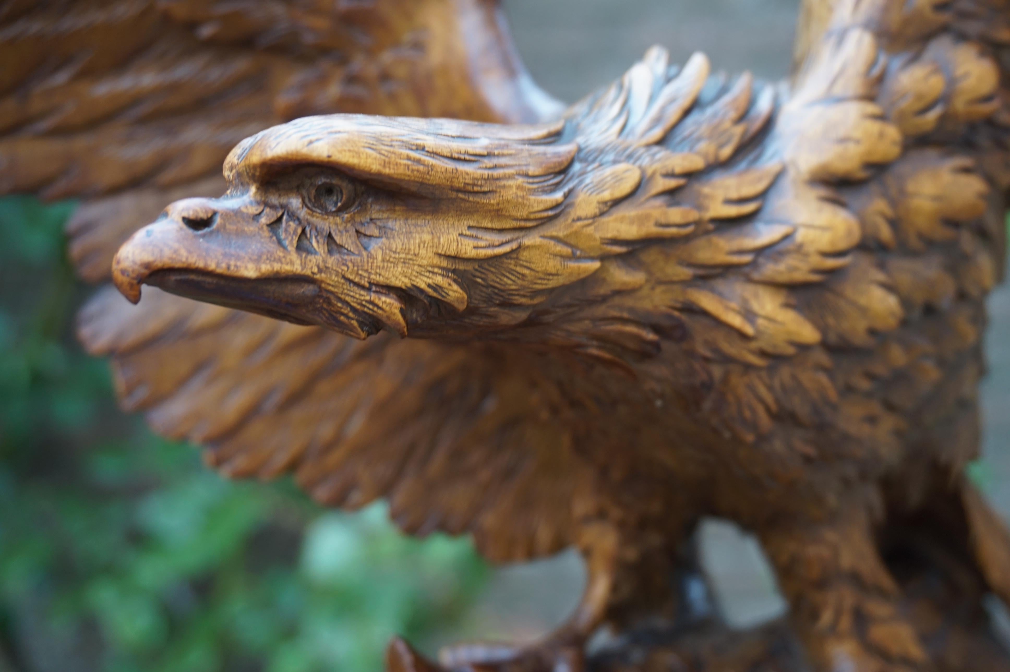Swiss Antique Hand-Carved Black Forest Eagle, Spread Wings on Tree Trunk Sculpture