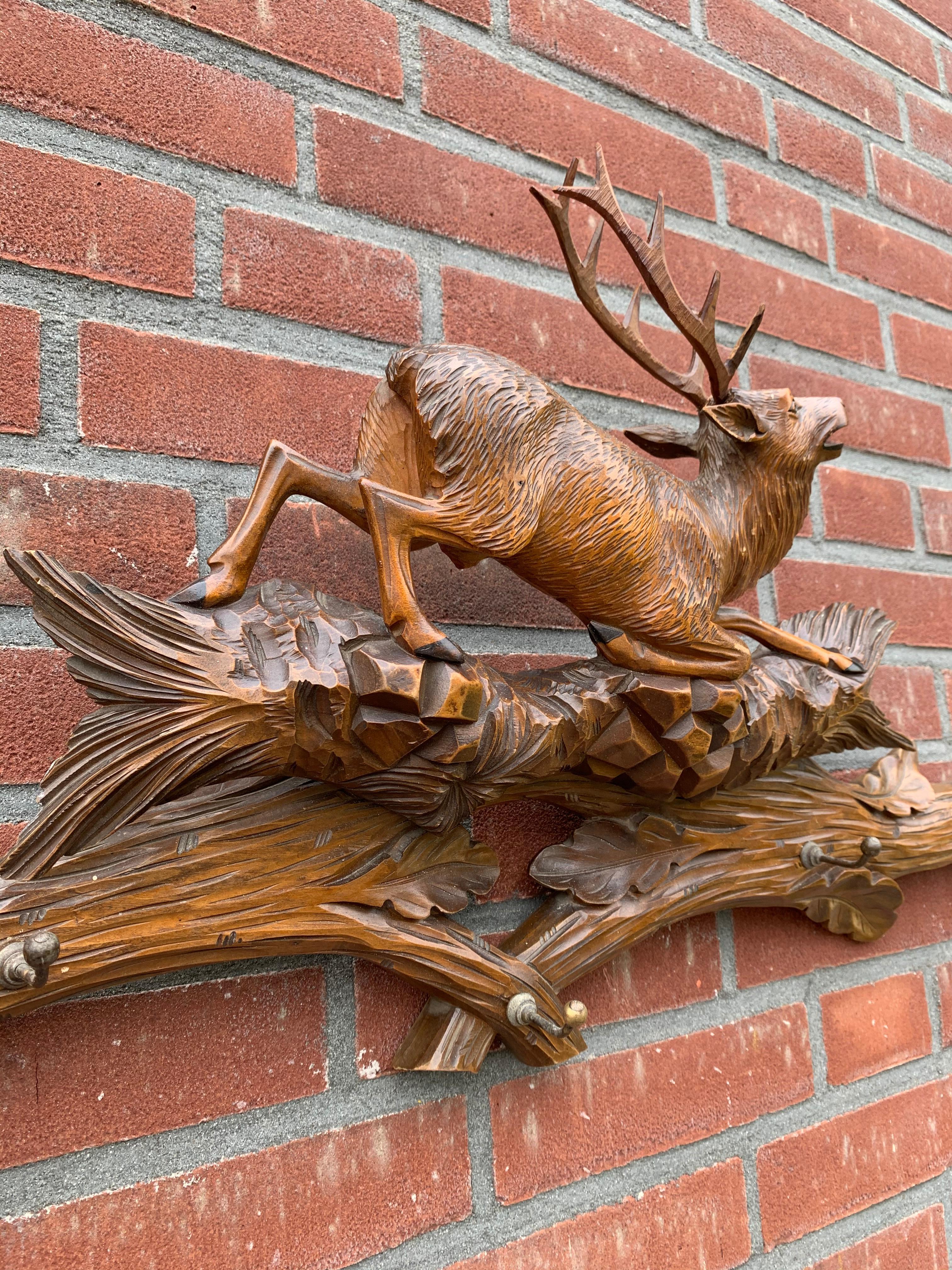 20th Century Great Antique Hand Carved Black Forest Wall Coat Rack with Deer Stag on the Top