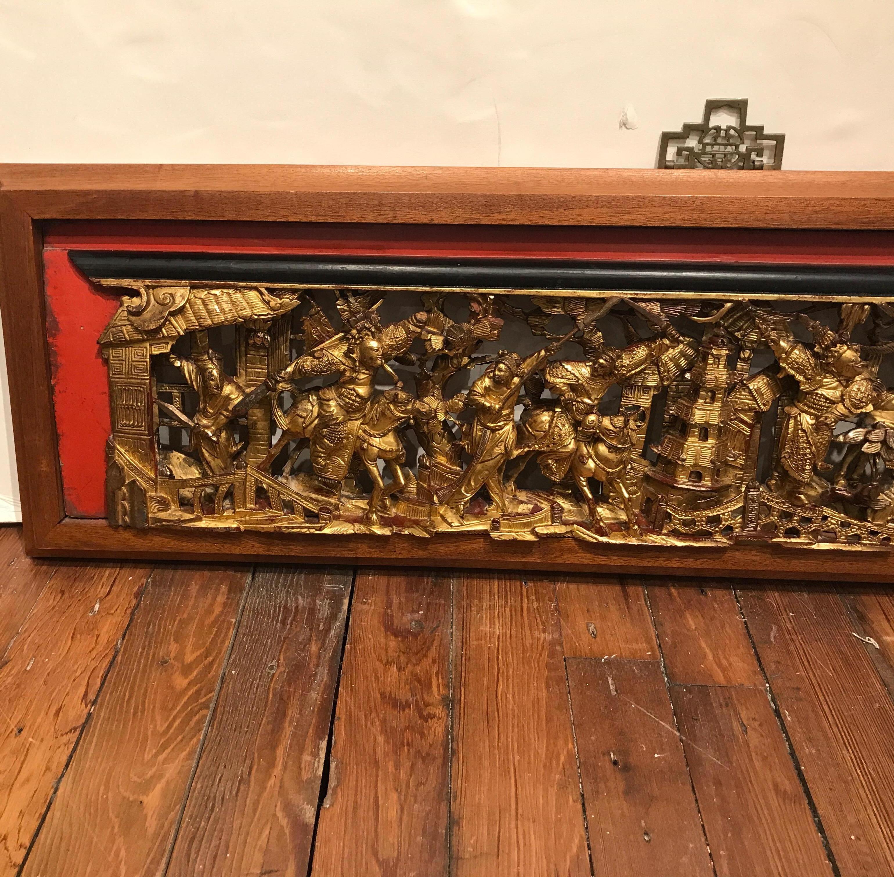 Exceptional mid-19th century hand carved Equestrian battle scene with later hardwood frame. This panel is very long at 92.5 inches. The remarkable detail by a master carver, circa 1850 depicting men and horses in a highly detailed presentation.