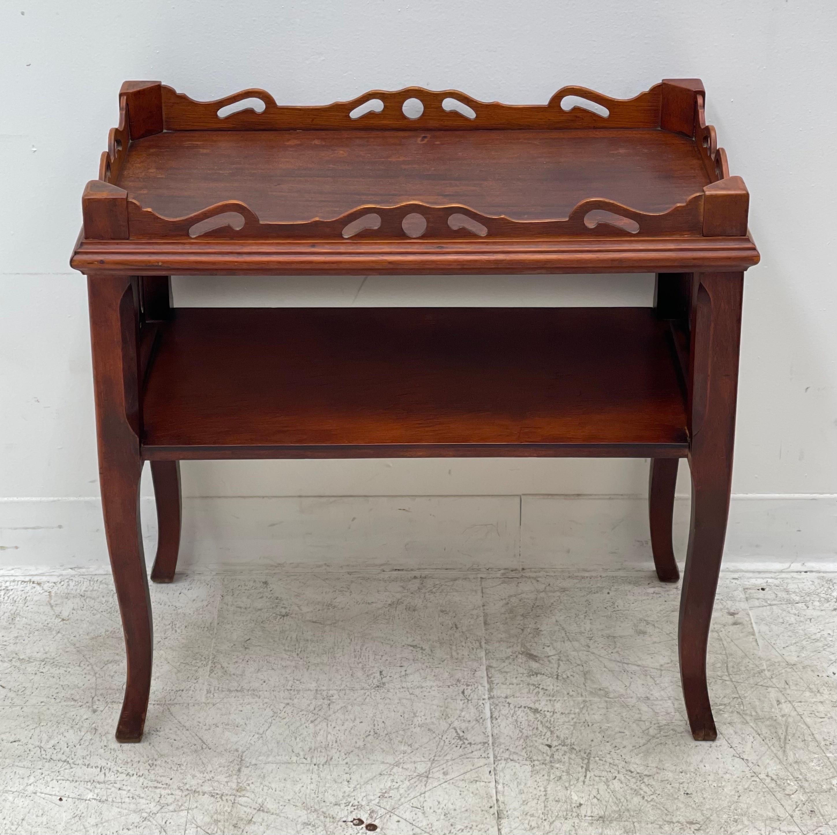 Antique hand carved coffee table.

Dimensions. 25 W ; 15 D ; 24 H.