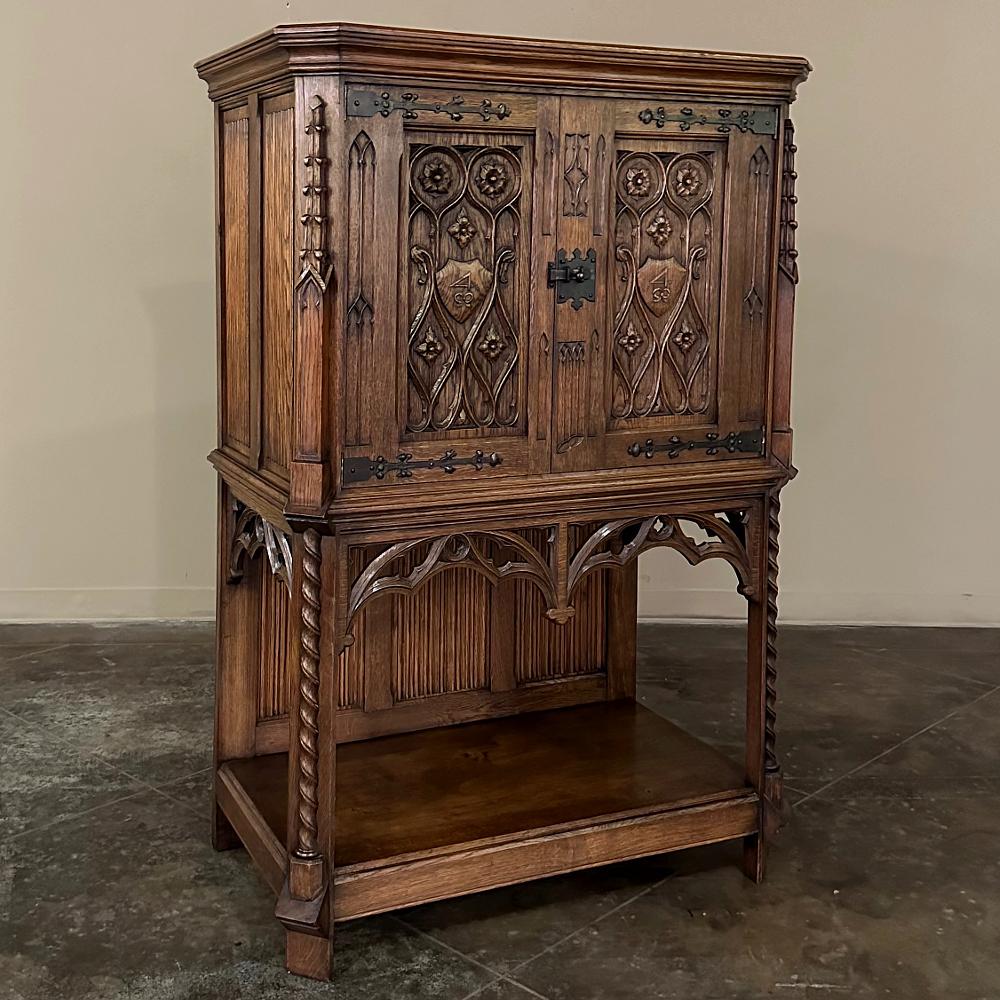 Antique Hand-Carved Gothic Revival Raised Cabinet is of a type that was originally designed for easy access to frequently used items, and desirable in pretty much all rooms of the home and office. Hand-crafted from beautiful, solid oak, it features