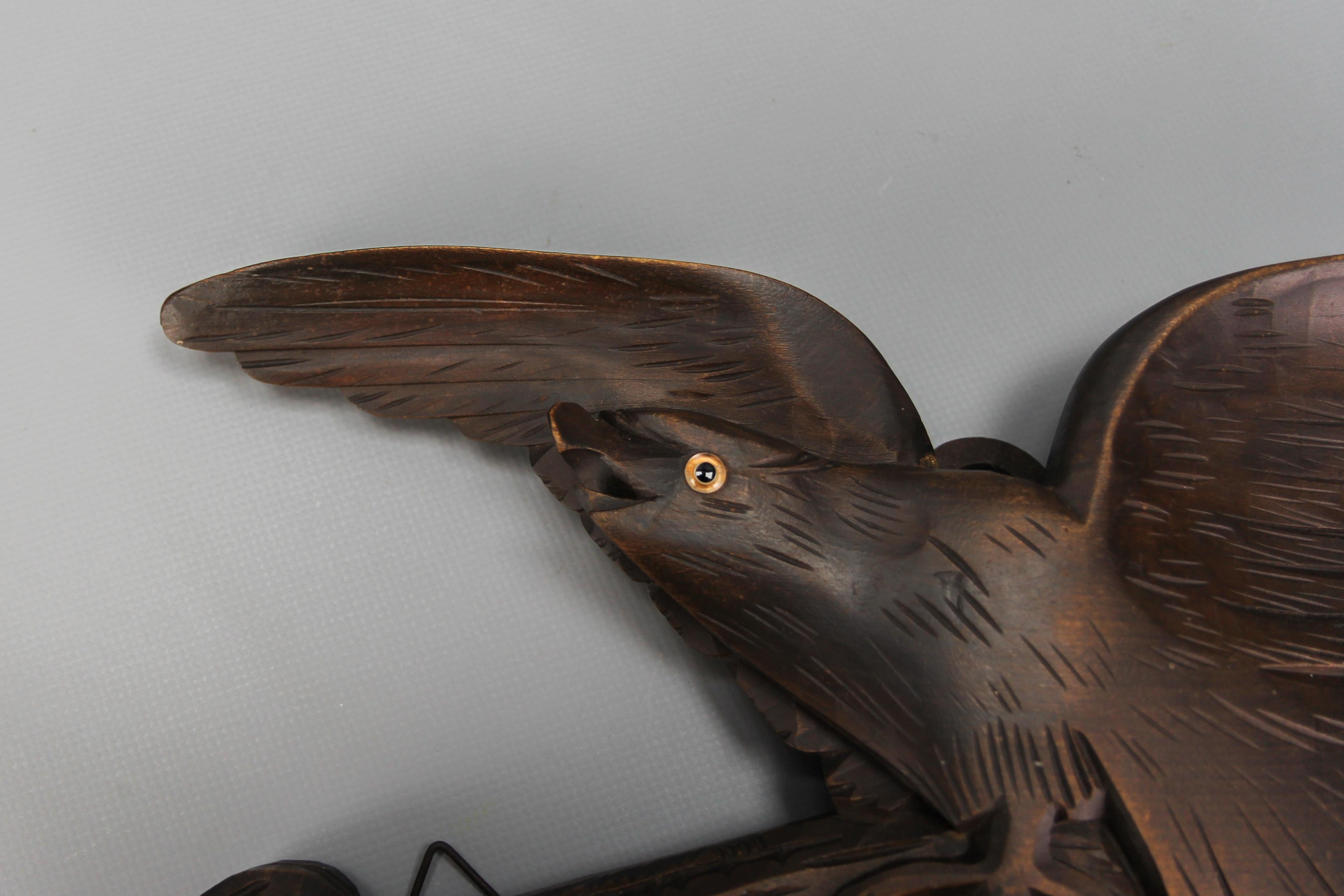 Art Deco Antique Hand-Carved Hat Rack with Bird and Three Wooden Hooks, Germany, Ca. 1920 For Sale