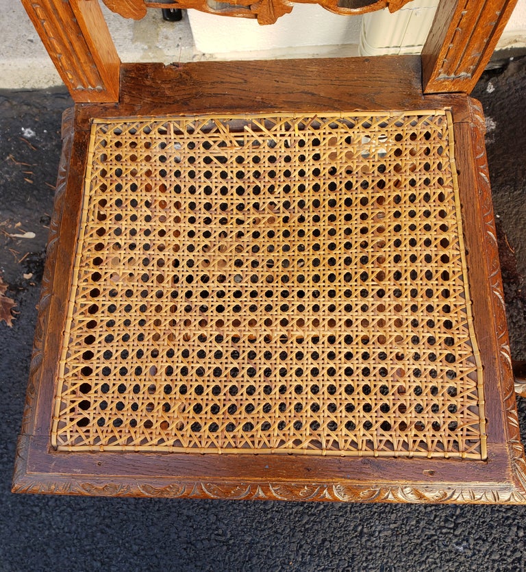Antique Hand Carved Jacobean Oak and Cane Dining Chairs, Circa 1910s, a Set For Sale at 1stDibs