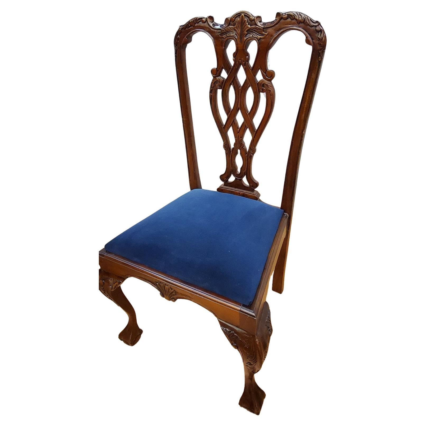 Vintage Hand Carved Mahogany Chippendale Eagle Claw Dining Chairs - Set of 6

A beautiful vintage set of six solid mahogany Chippendale dining chairs with ornate carvings all around. Consists of four side chairs and two armchairs with ball and claw