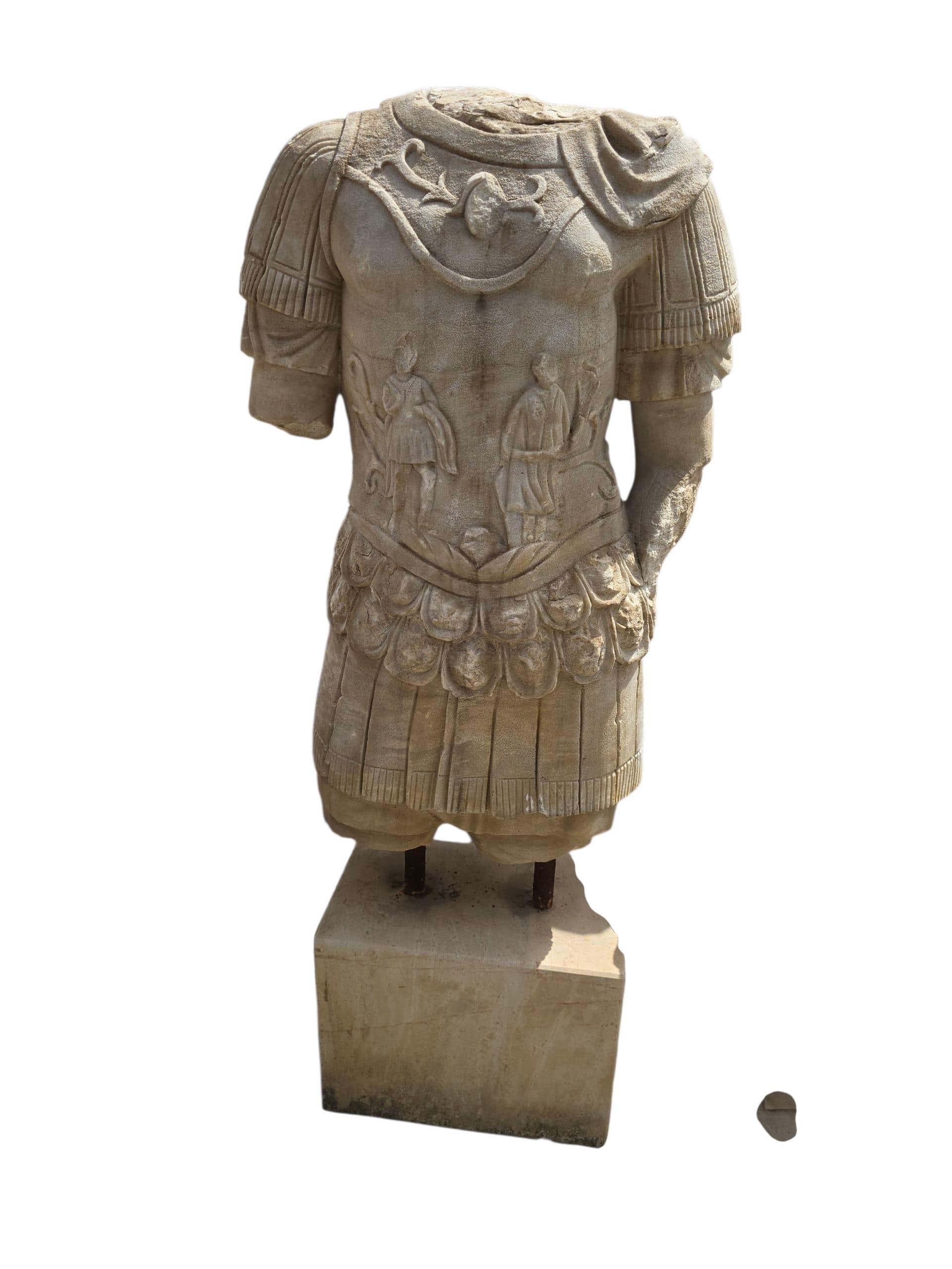 Impressive and finely detailed marble sculpture of a Roman emperor, hand-carved in Italy in the early 20th century. The figure is portrayed in full imperial armor, including a richly adorned cuirass and cloak, exemplifying classical Roman strength