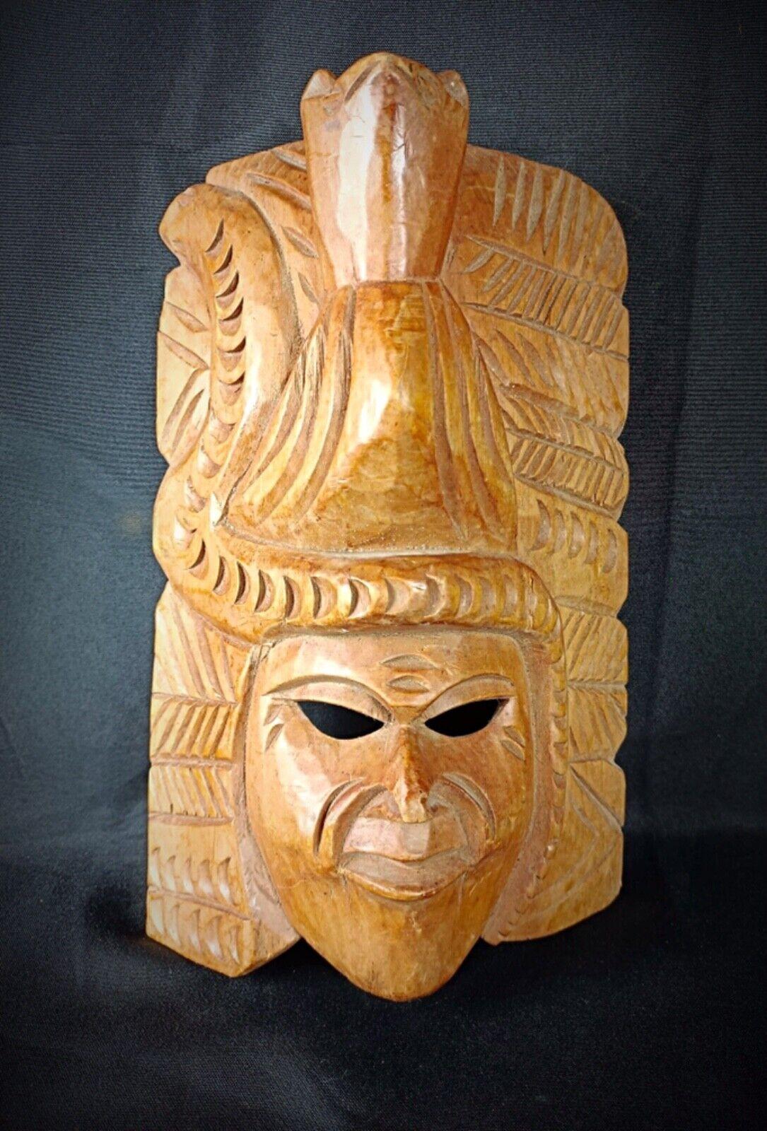 Enhance your collection with this exquisite antique Maya mask, a stunning example of Indigenous American art. Hand-carved from wood, this mask showcases intricate craftsmanship and reflects the rich cultural heritage of the Maya civilization.

In