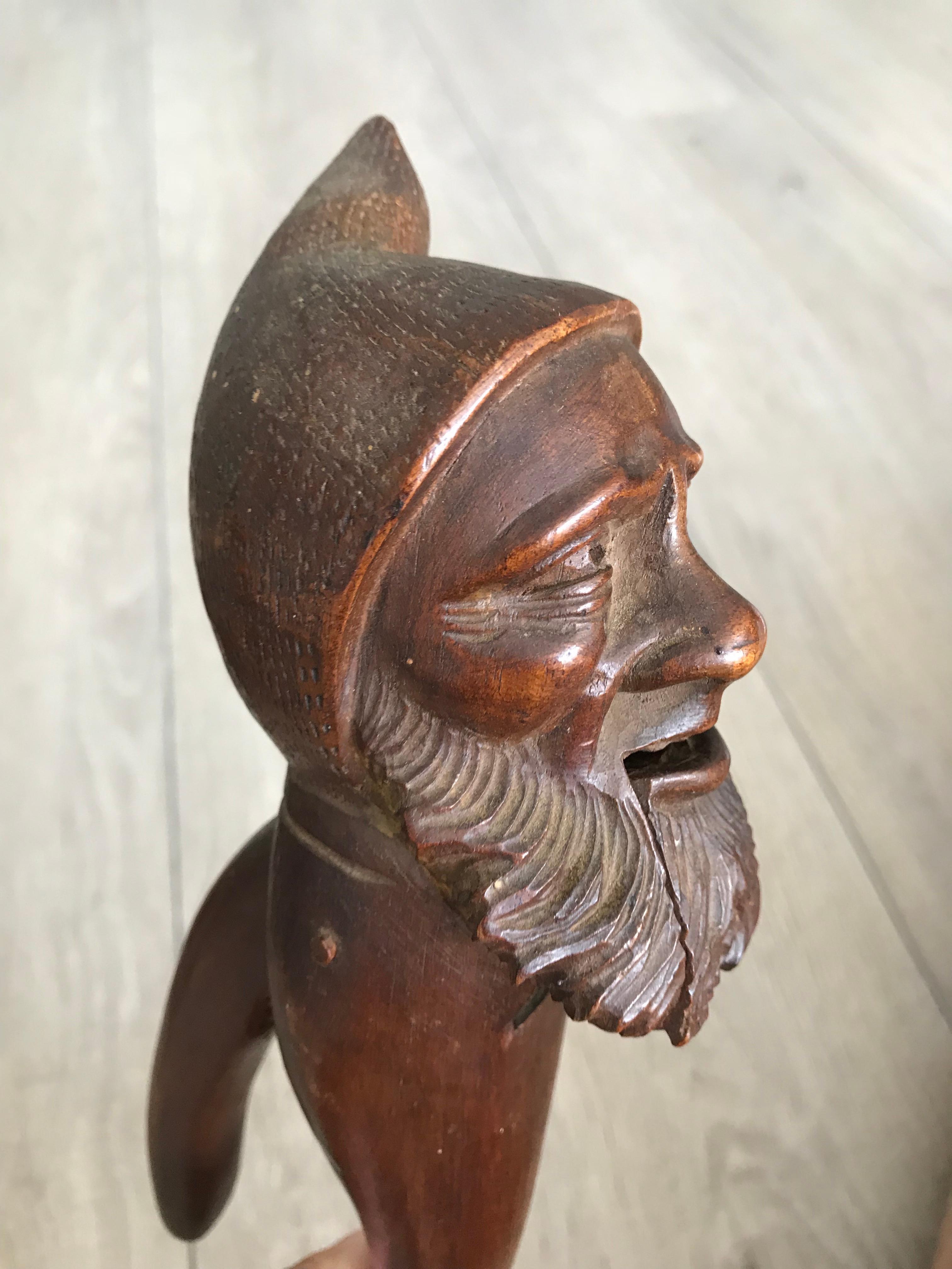 Top quality carved, early 20th century, wooden Black Forest nut cracker. 

If you are a collector of only the best quality and condition Black Forest antiques then this gnome nut cracker could be the perfect addition to your collection. This antique