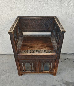 Antique hand-carved Moorish Armchair in solid oak, Spain 19th Century