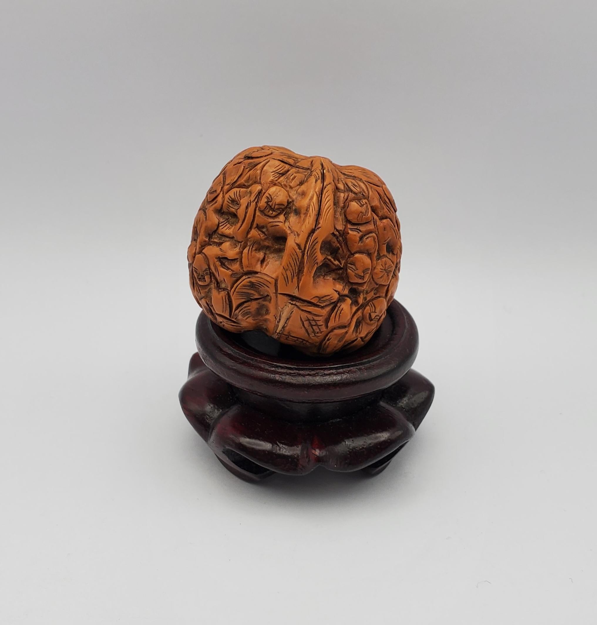 Antique Hand Carved Netsuke 1000 Faces Walnut & Carved Wooden Pedestal In Good Condition For Sale In Pittsburgh, PA