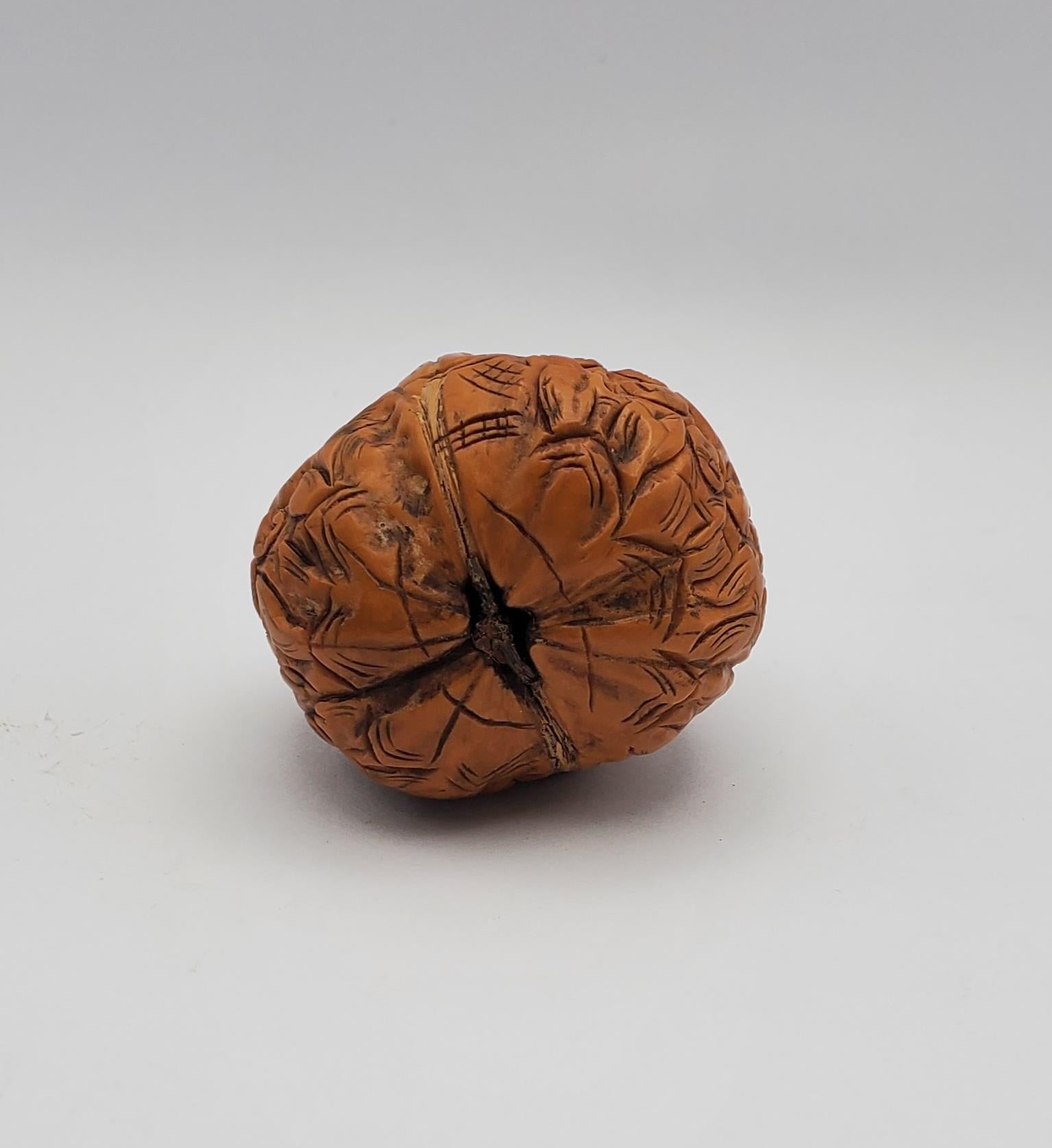 Women's or Men's Antique Hand Carved Netsuke 1000 Faces Walnut & Carved Wooden Pedestal For Sale