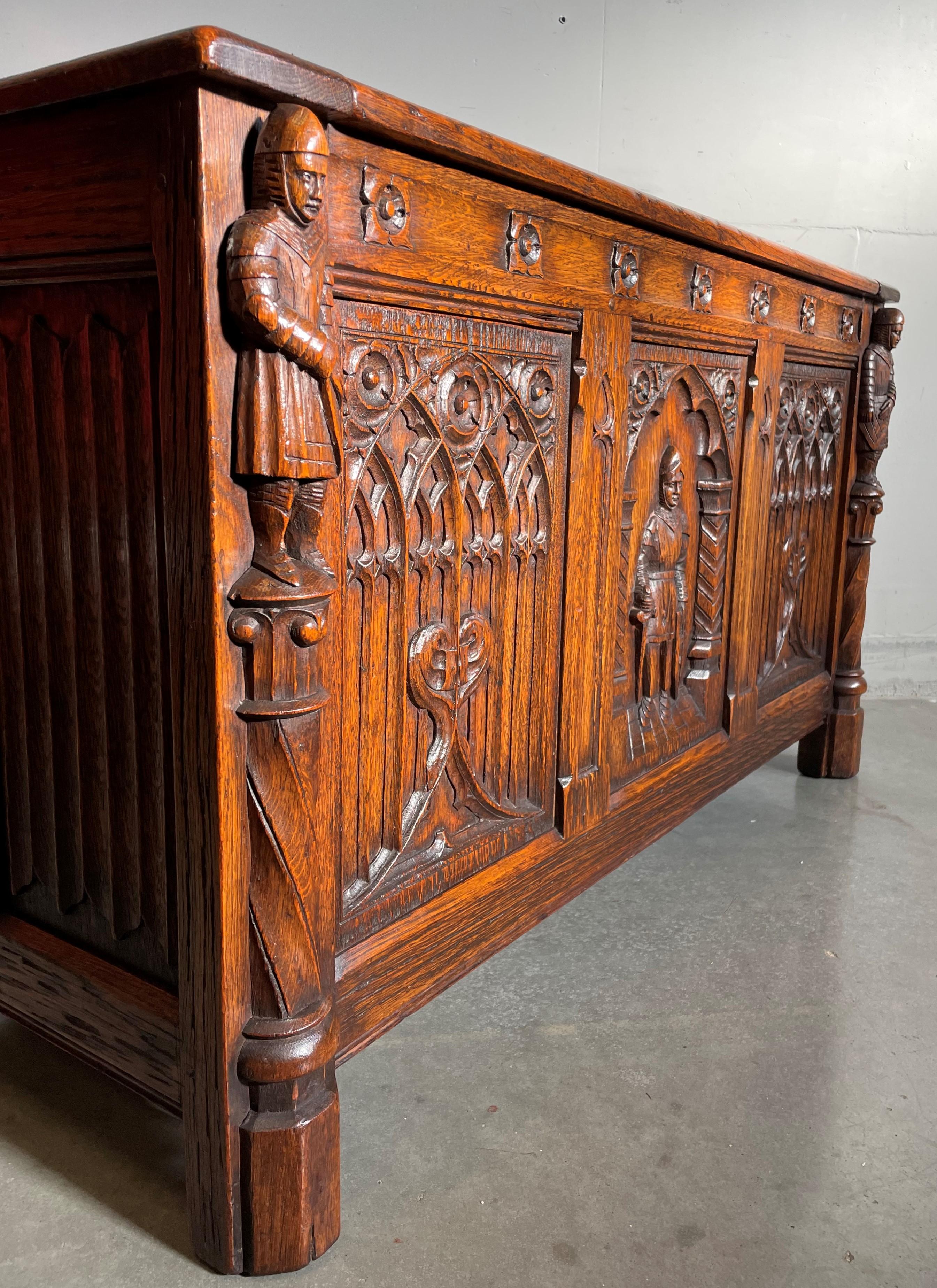 Gothic Revival Antique Hand Carved Oak Gothic Blanket Chest w. Church Window Panels & Knight For Sale