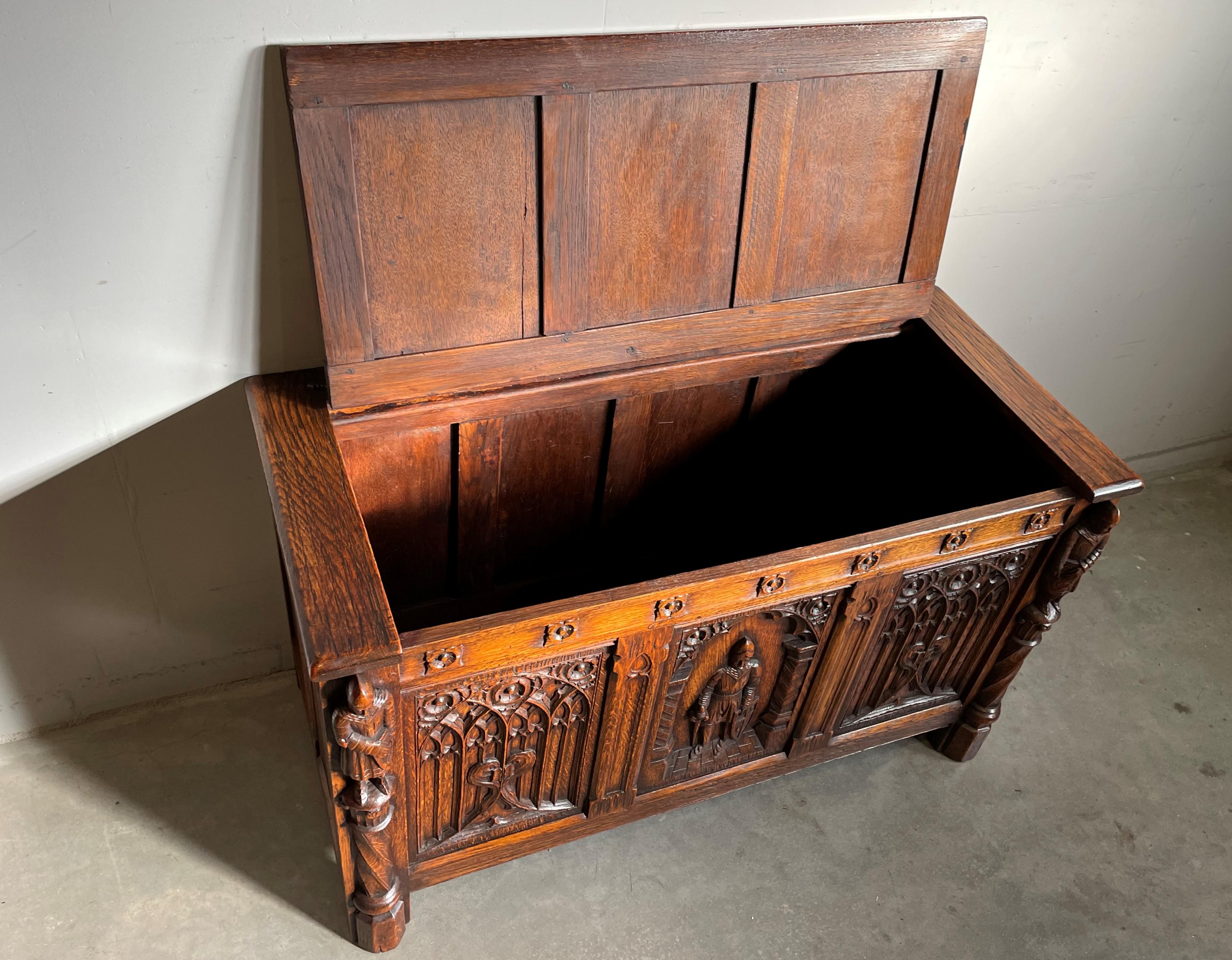 European Antique Hand Carved Oak Gothic Blanket Chest w. Church Window Panels & Knight For Sale