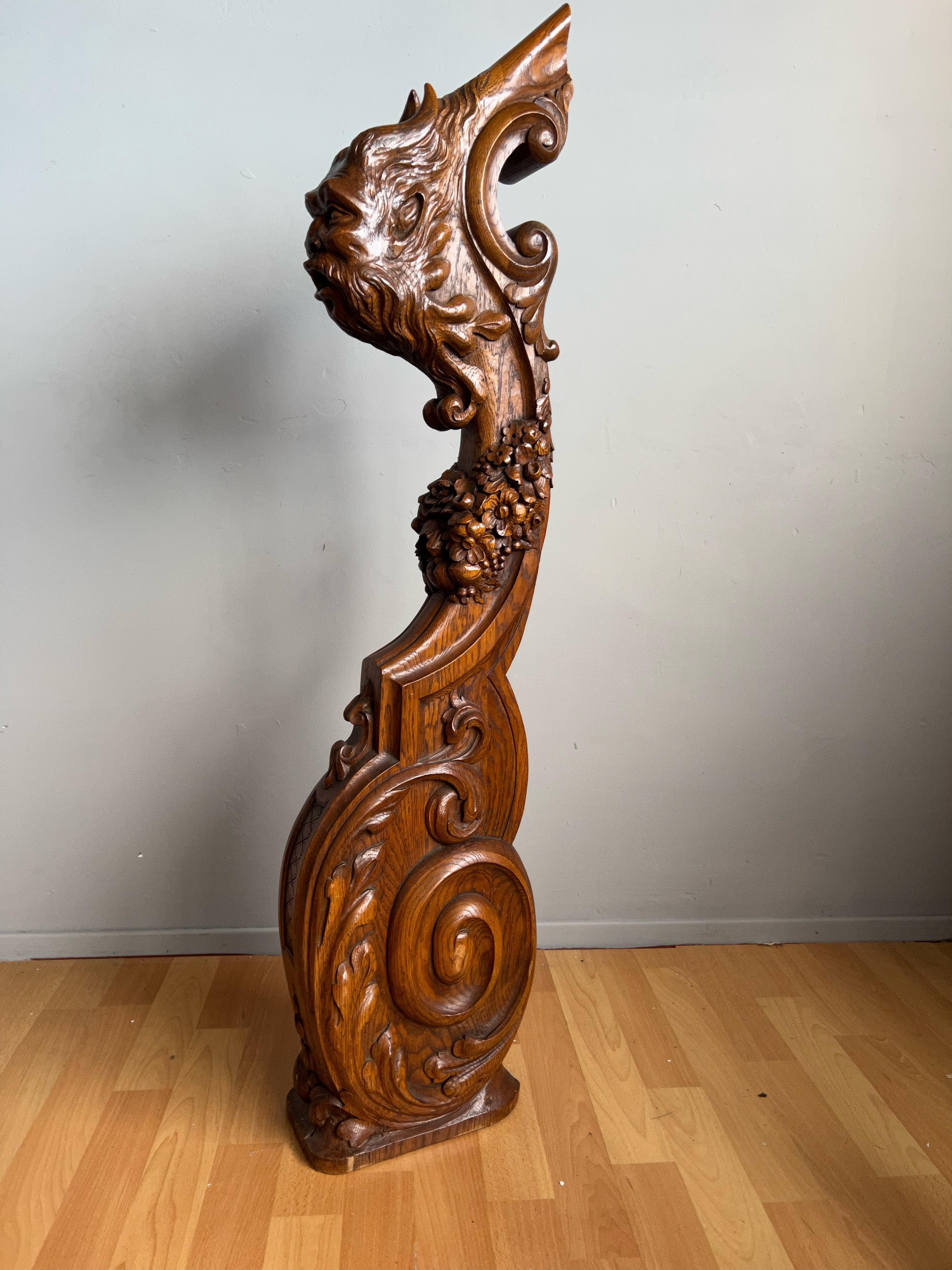 Unique and top quality carved stair newel post from the 1800s with a fabulous fable creature.

This unique architectural stairway element can only and exclusively have been hand-crafted for a 19th century mansion or public building. We think it is