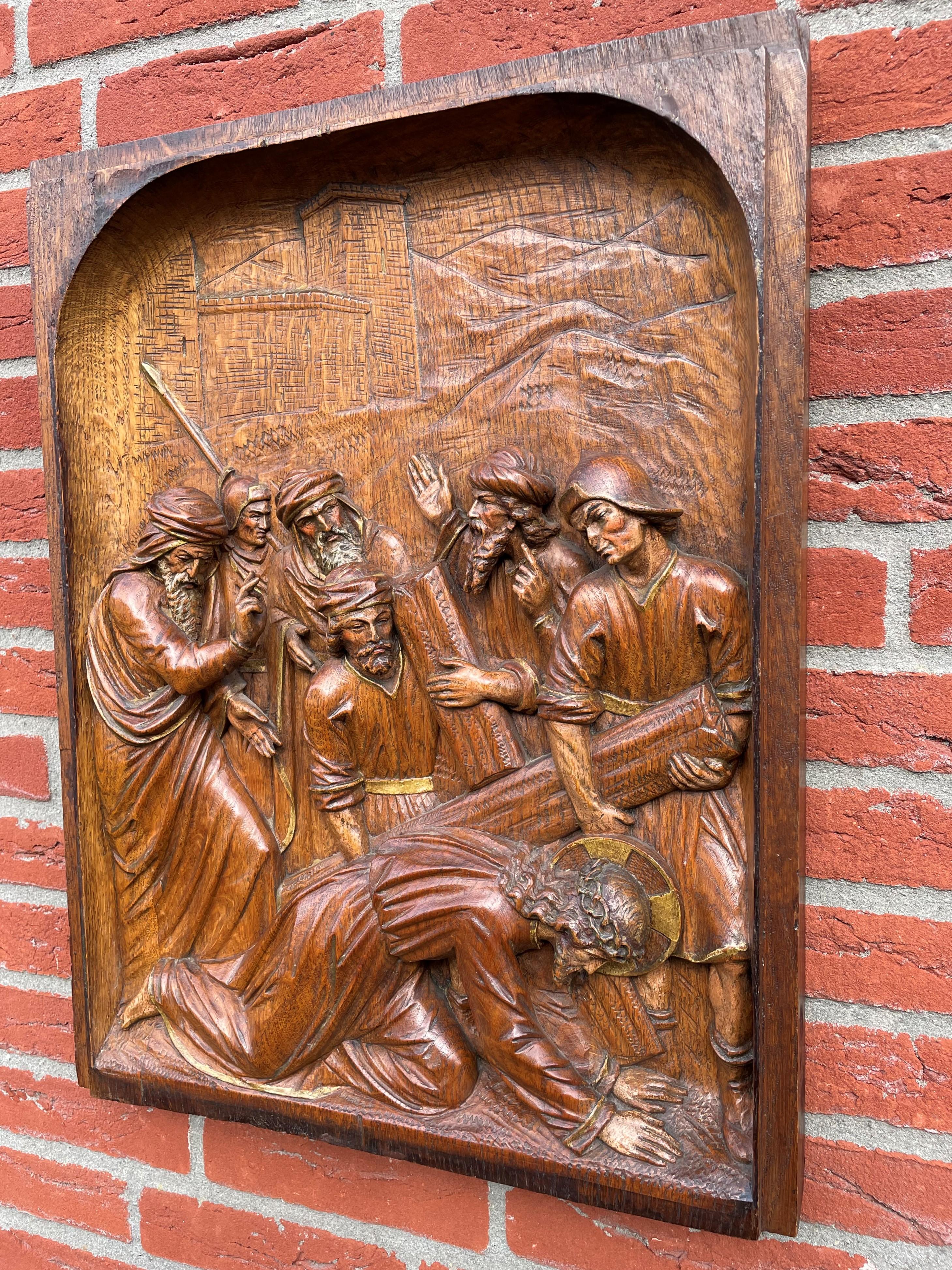 Stunning and deeply carved work of religious art.

This good size and all hand carved, solid oak wall plaque depicts Jesus as He has fallen for the third time. In the way of the cross this is known as the ninth station and you will rarely find a