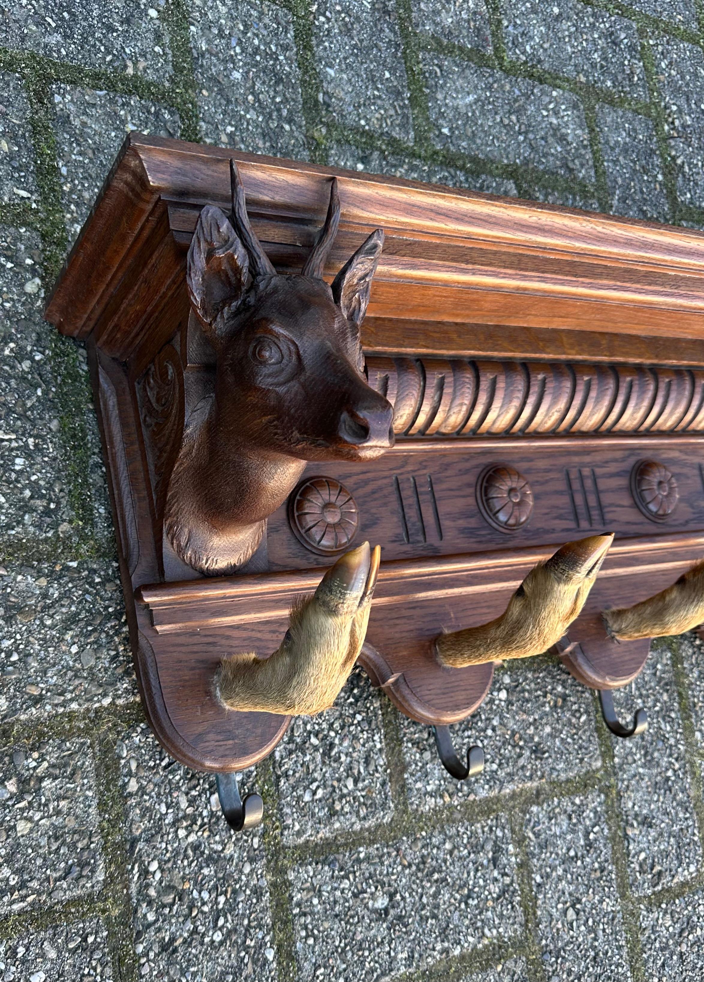 Arts and Crafts Antique Hand Carved Oak Wood Wall Coat Rack with Deer Head Sculptures circa 1890 For Sale