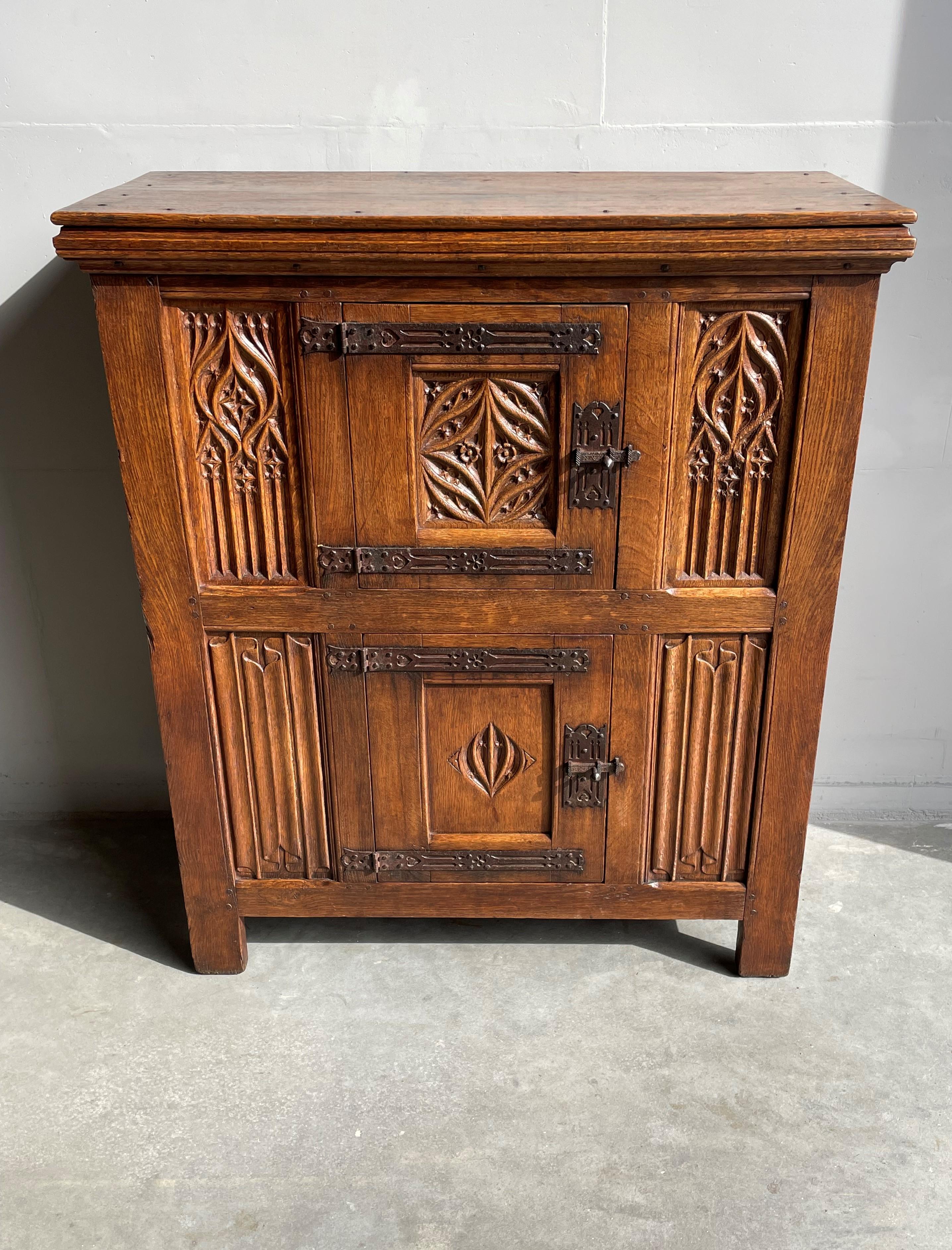 Marvelous and practical Gothic Revival cabinet from the early 1800s.

This rare, Dutch workmanship, Gothic Revival cabinet from the early 19th century for several reasons is another one of our recent great finds. First of all, this ecclesiastical