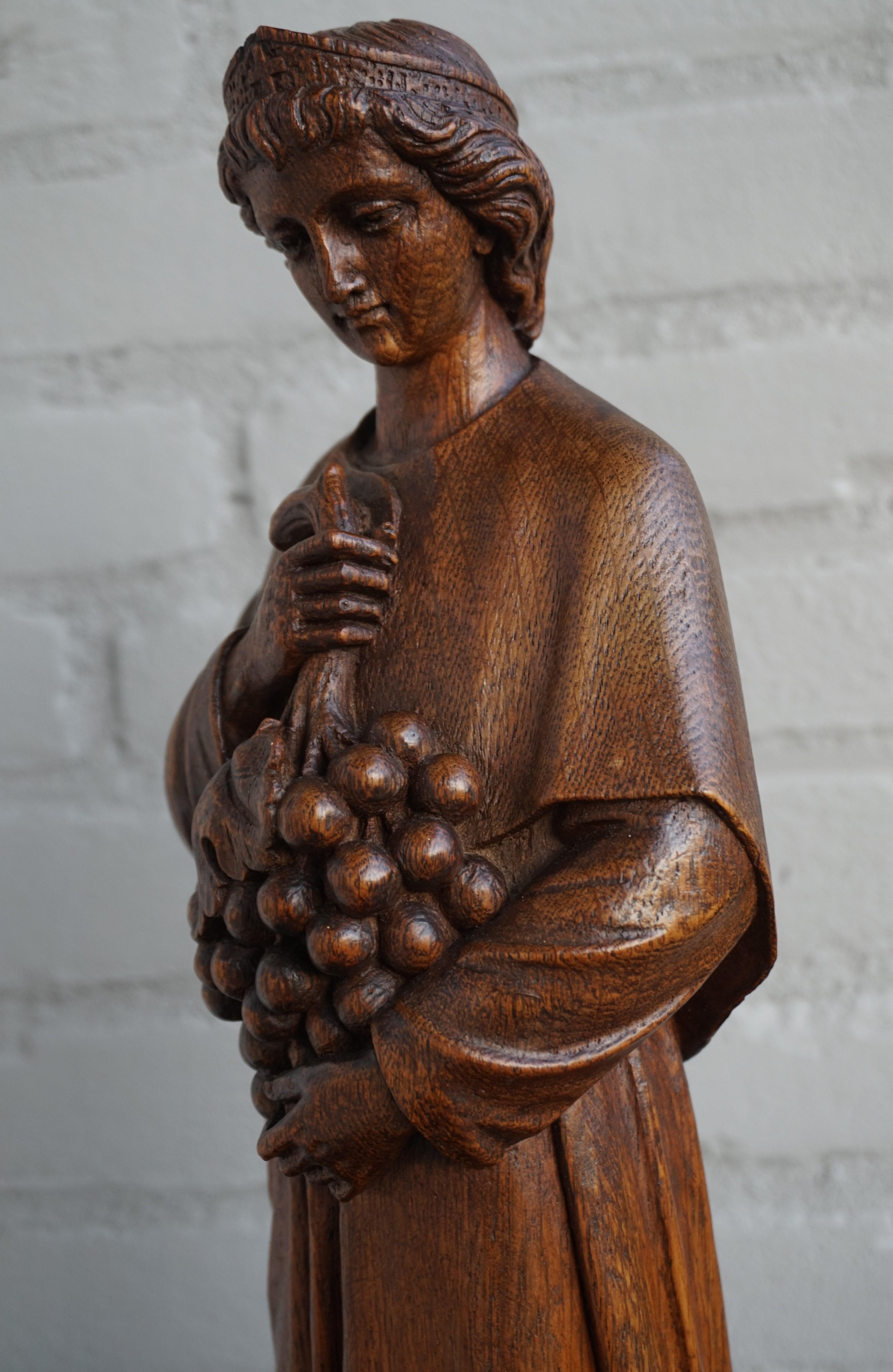 Gothic Revival Antique Hand Carved Oakwood Church Sculpture of a Saint Holding a Grape Bunch