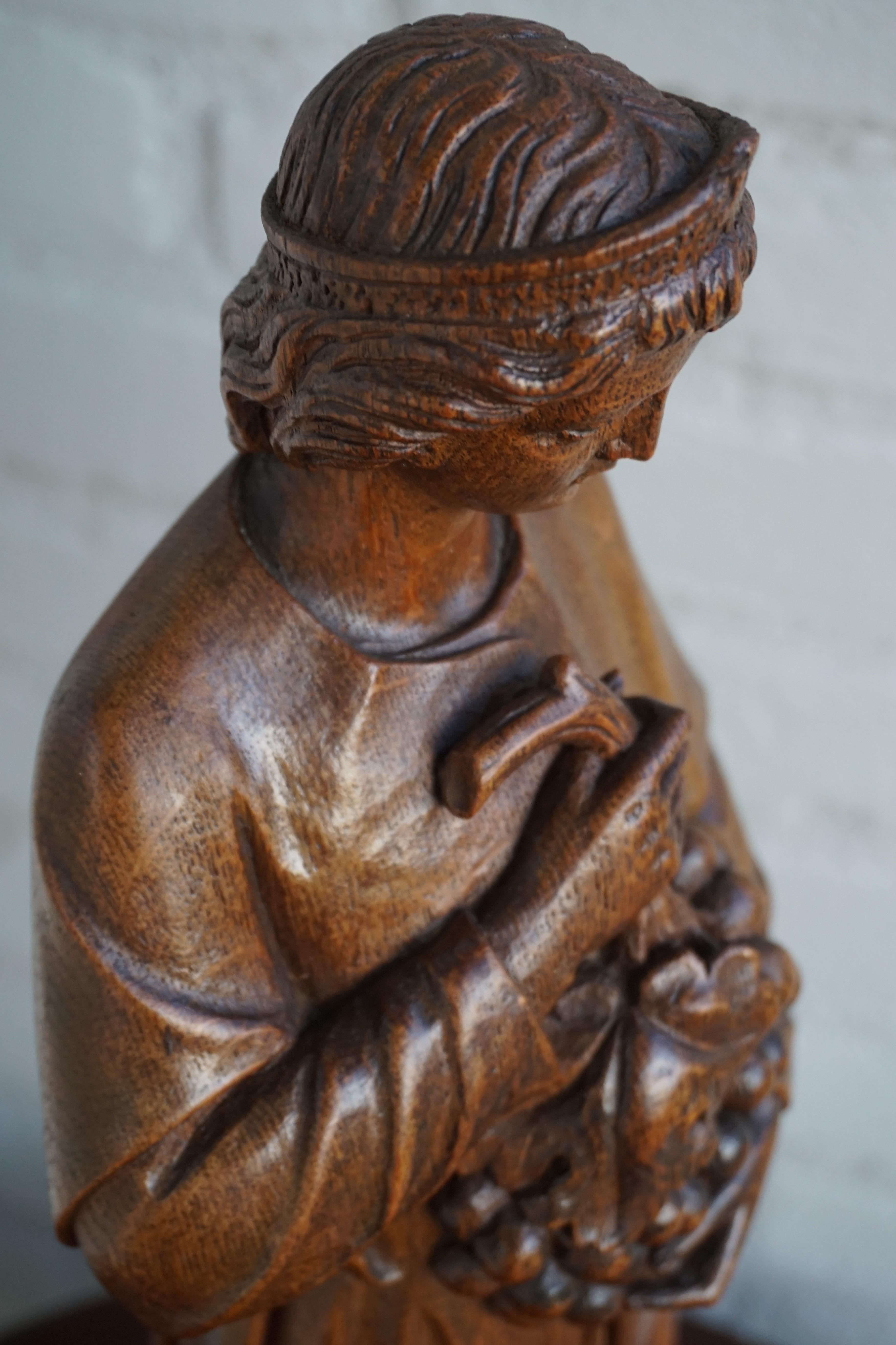 Hand-Carved Antique Hand Carved Oakwood Church Sculpture of a Saint Holding a Grape Bunch