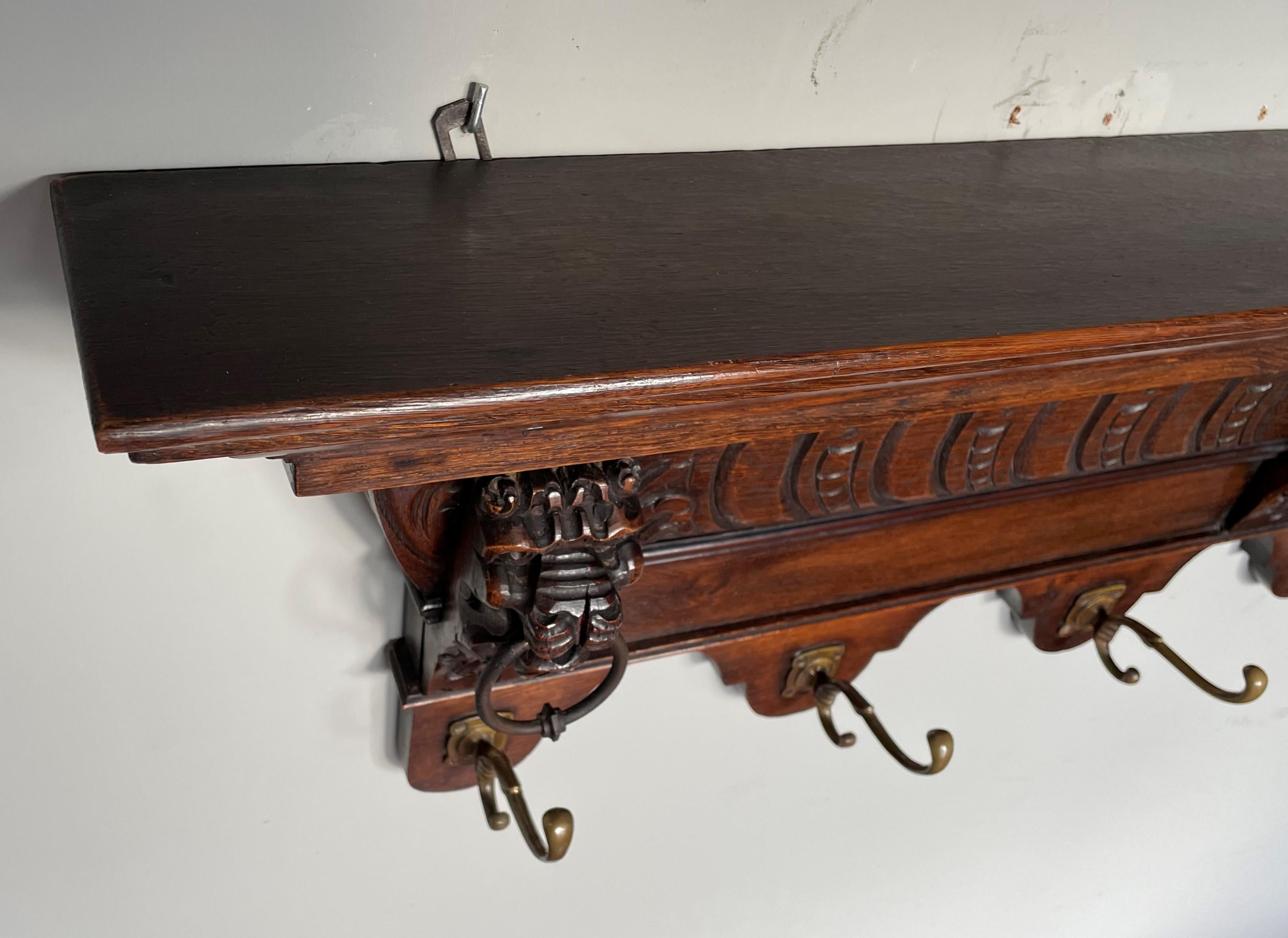 20th Century Antique Hand Carved Renaissance Revival Wall Coat Rack with Lion Mask Sculptures