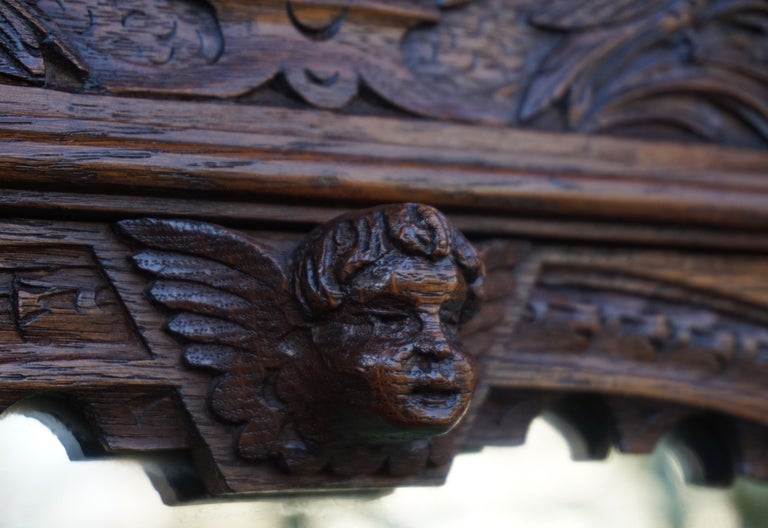 Hand Carved Renaissance Revival Wall Mirror with Lidded Gloves and