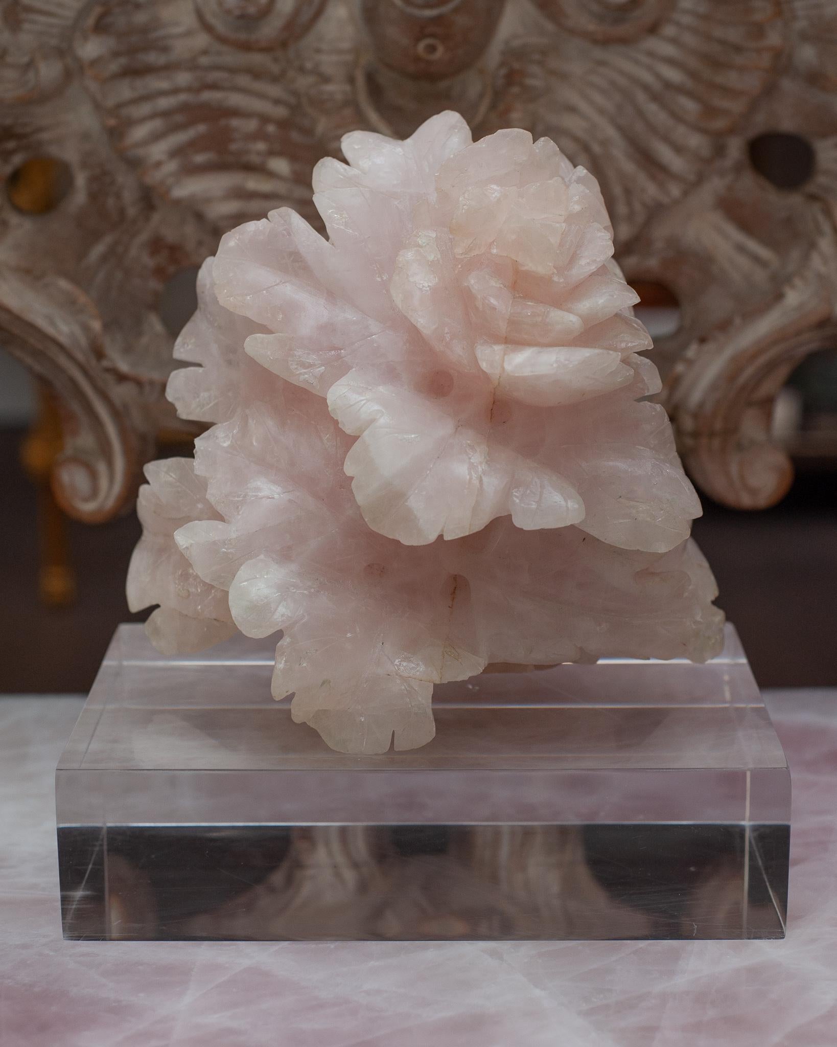 A stunning and highly detailed antique Chinese rose quartz flower sculpture. Carved from a solid block of rose quartz this decorative piece is equally as beautiful in a modern or traditional interior. Rose quartz, the universal stone of love,