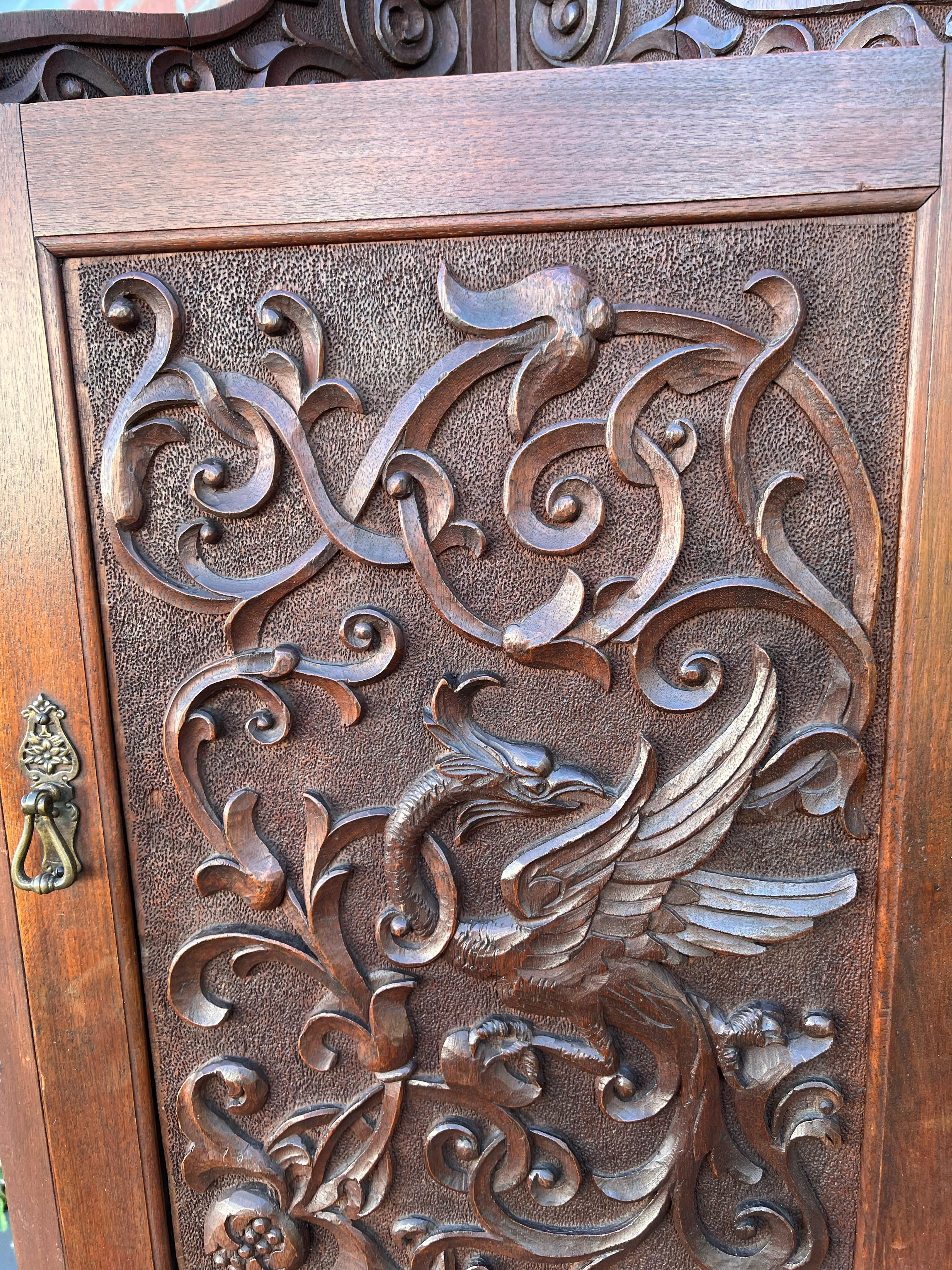 Antique Hand Carved Solid Nutwood Wall Corner Cabinet w. Phoenix Sculpture In Good Condition For Sale In Lisse, NL