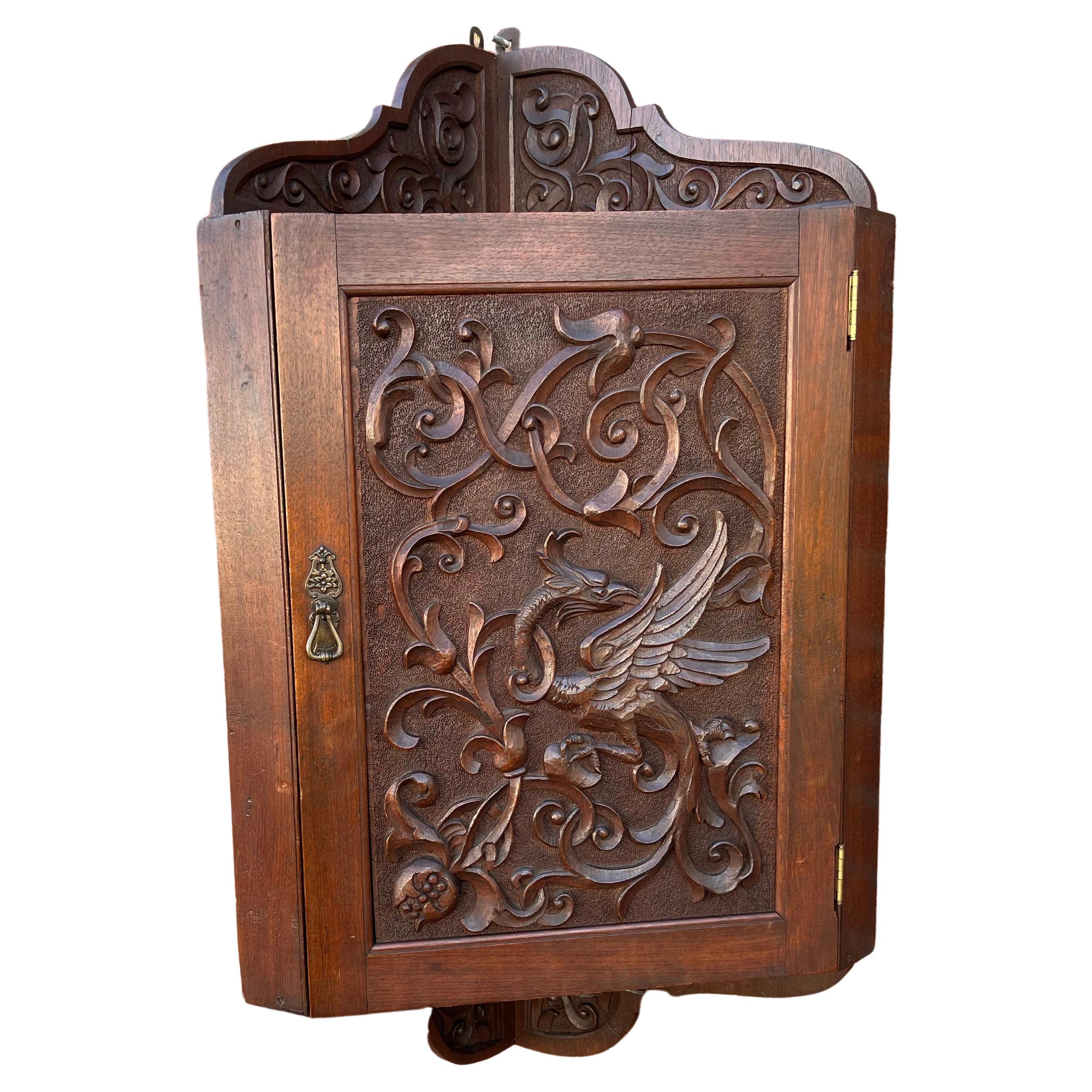 Antique Hand Carved Solid Nutwood Wall Corner Cabinet w. Phoenix Sculpture For Sale