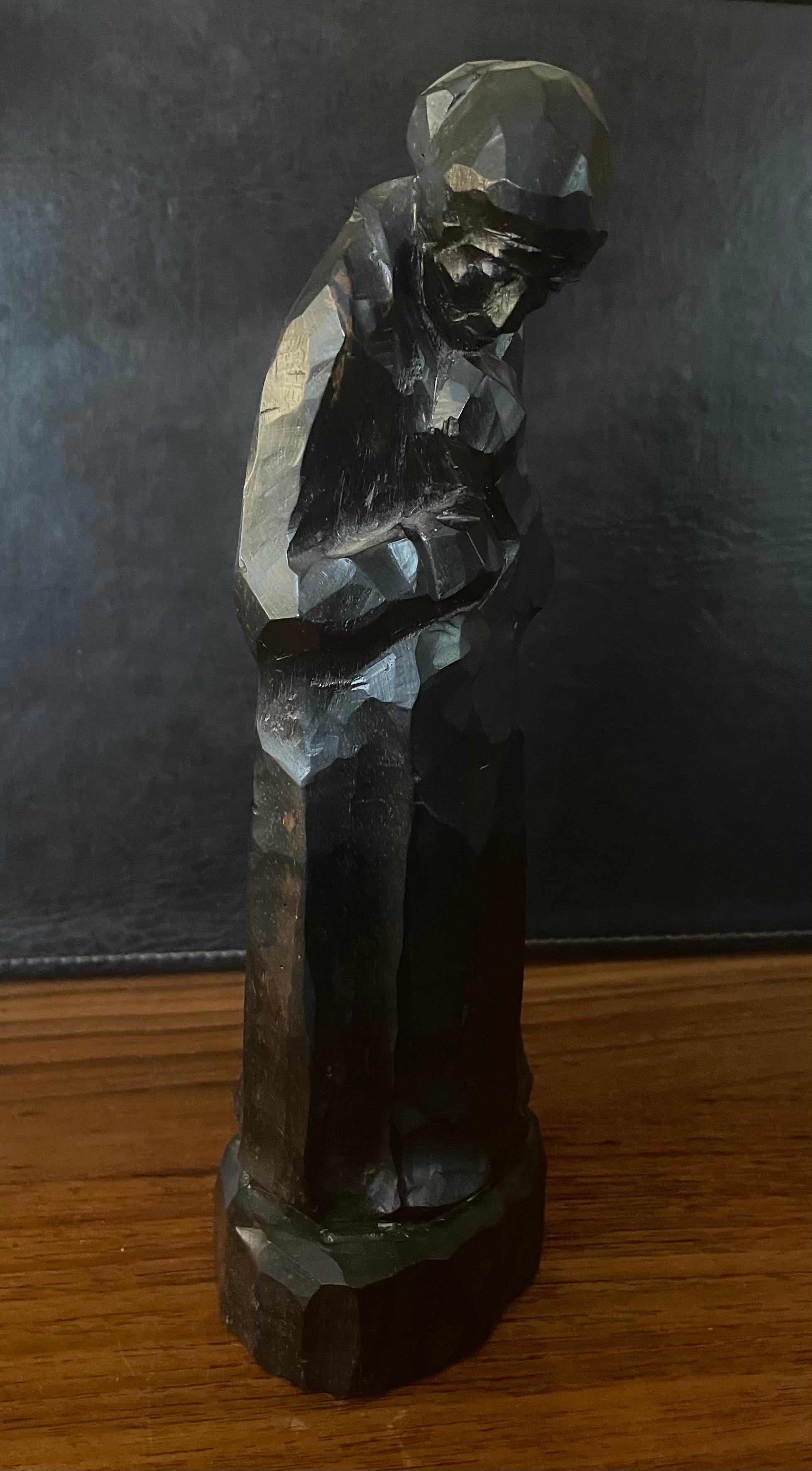 Well done antique hand-carved figurative sculpture by Anton Fortuin, circa 1926. The piece is in very good condition and measures 4.25