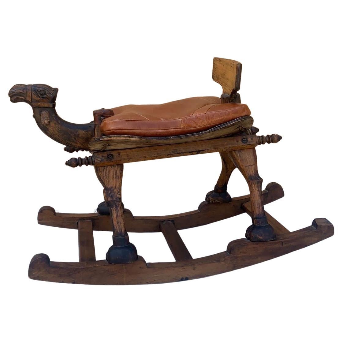 Antique Hand Carved Turkish Wood Camel Rocker with Leather Cushion Seat For Sale