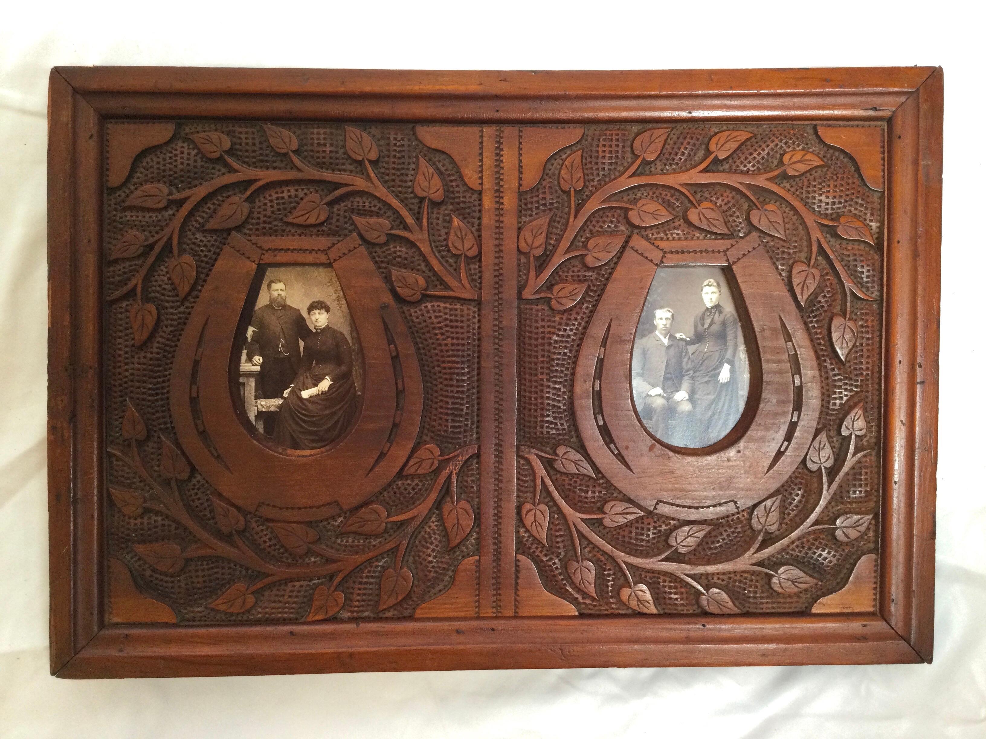 A well carved walnut Victorian Aesthetic movement picture frame with a tree of life design. Measures: 21 wide, 14 high, 1.5 deep, the picture insets are 4.75,. 3 wide.