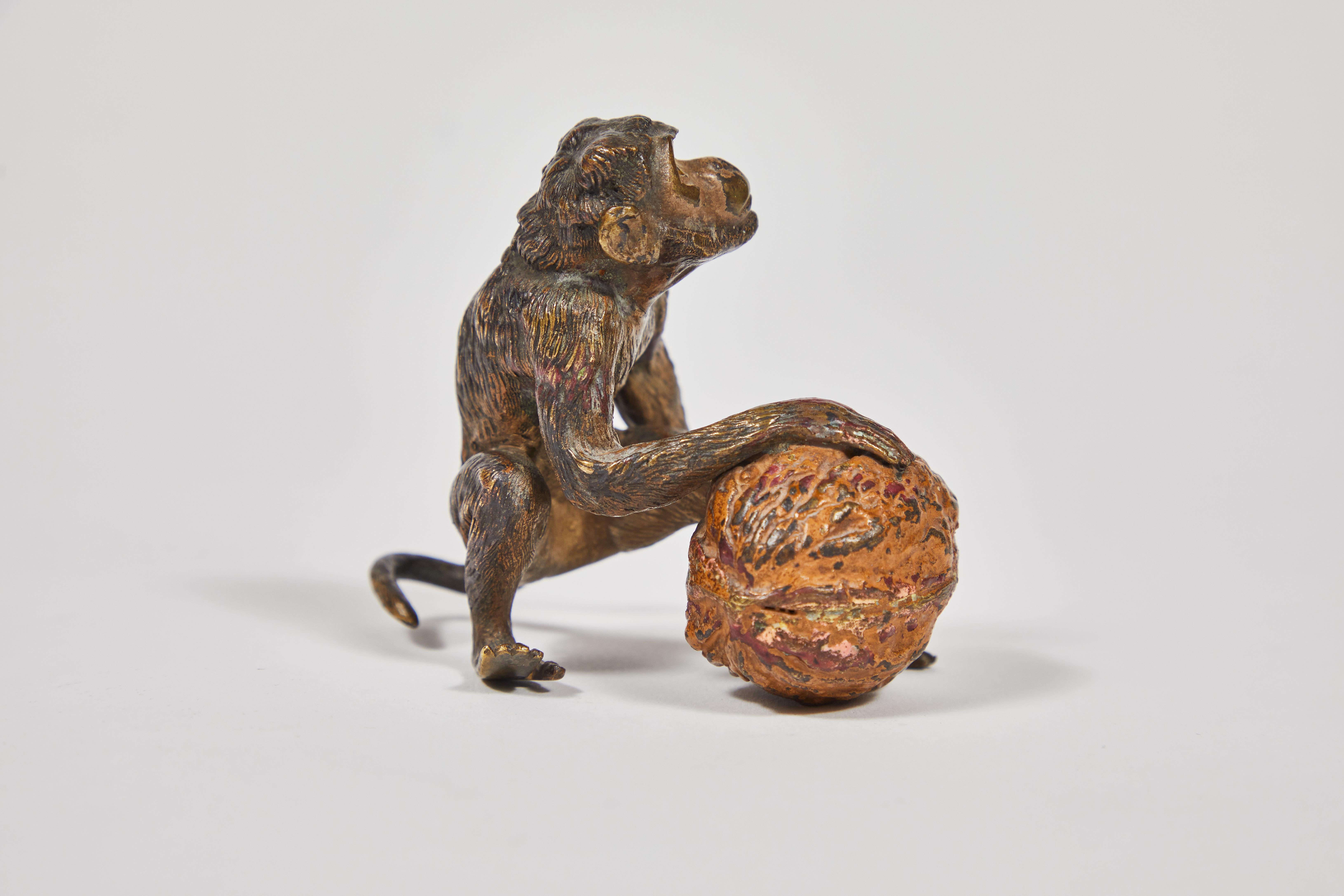 Cast Antique Hand Cold Painted Bronze Monkey with a Walnut
