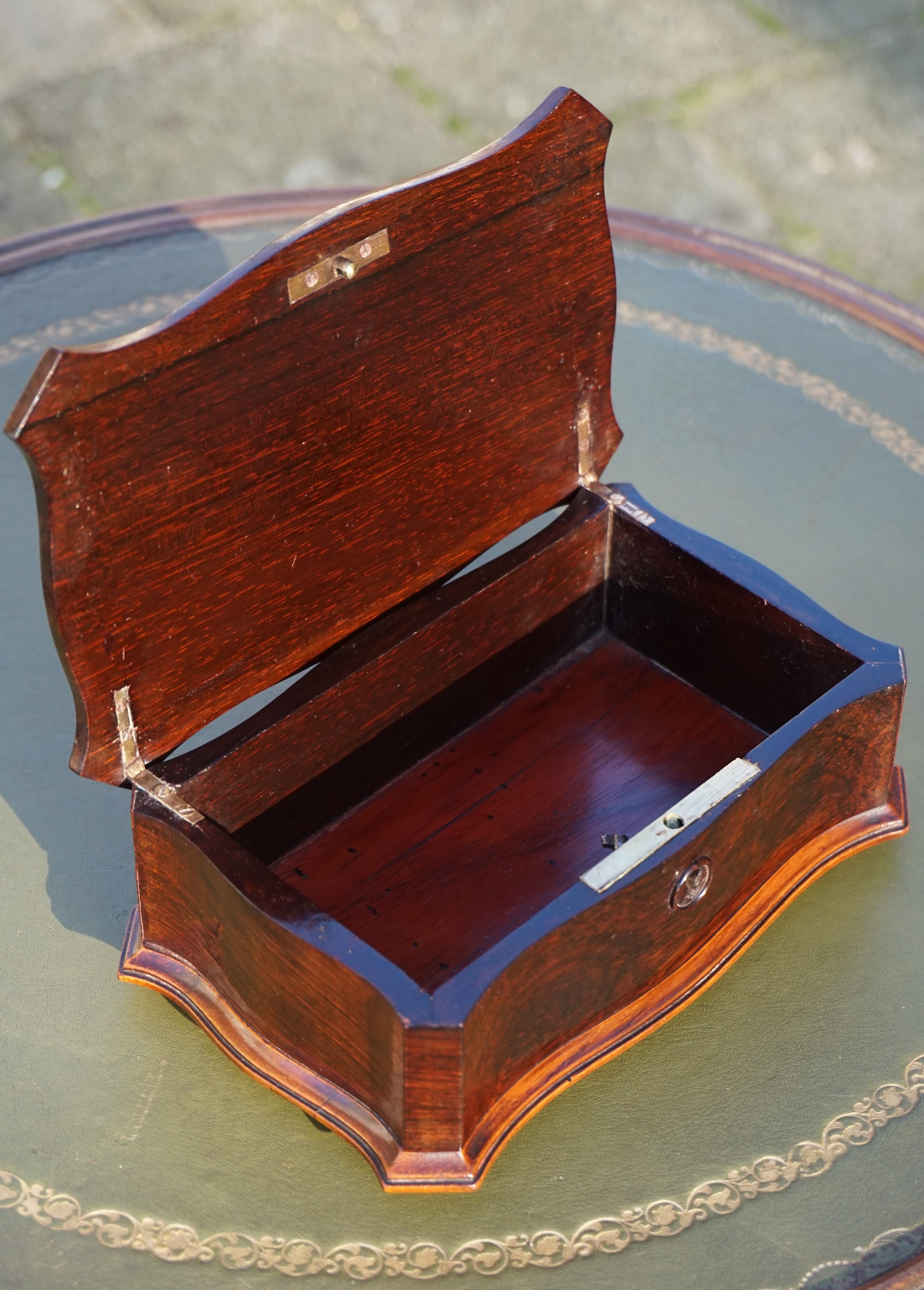 One of a kind and excellent condition antique box.

The rare shape of this mid-1800s box is just as aesthetically pleasing as its marvelous color. Coromandel is one of the most beautiful wood types with an amazing warm color and when it is as old as