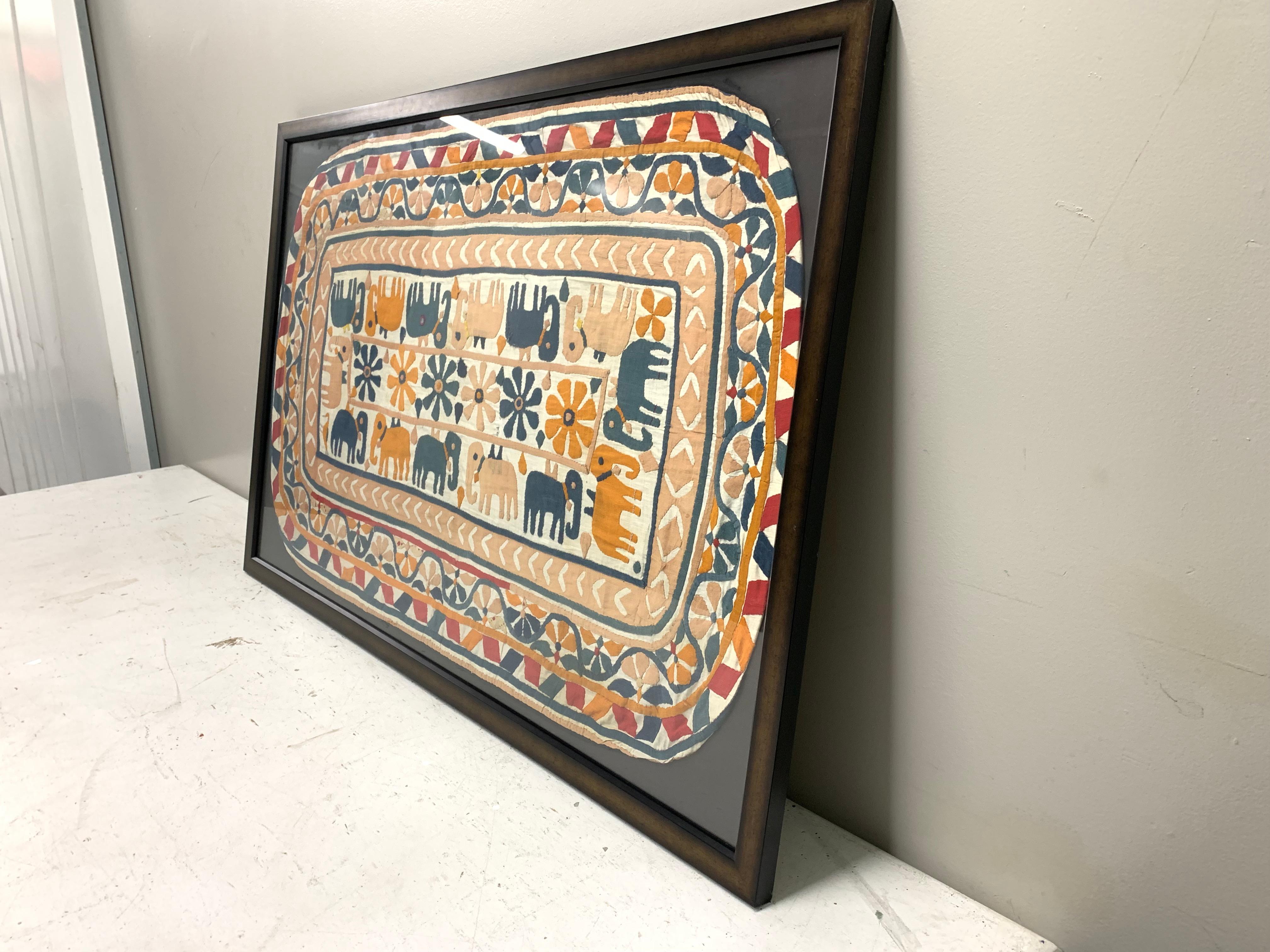 Antique hand embroidered textile from India framed, hand embroidered with bright vivid colors and mirrored details, nature and animal themes. Rajasthan Folk Art, these textiles were used for wedding lush seating cushions. You have to see close up