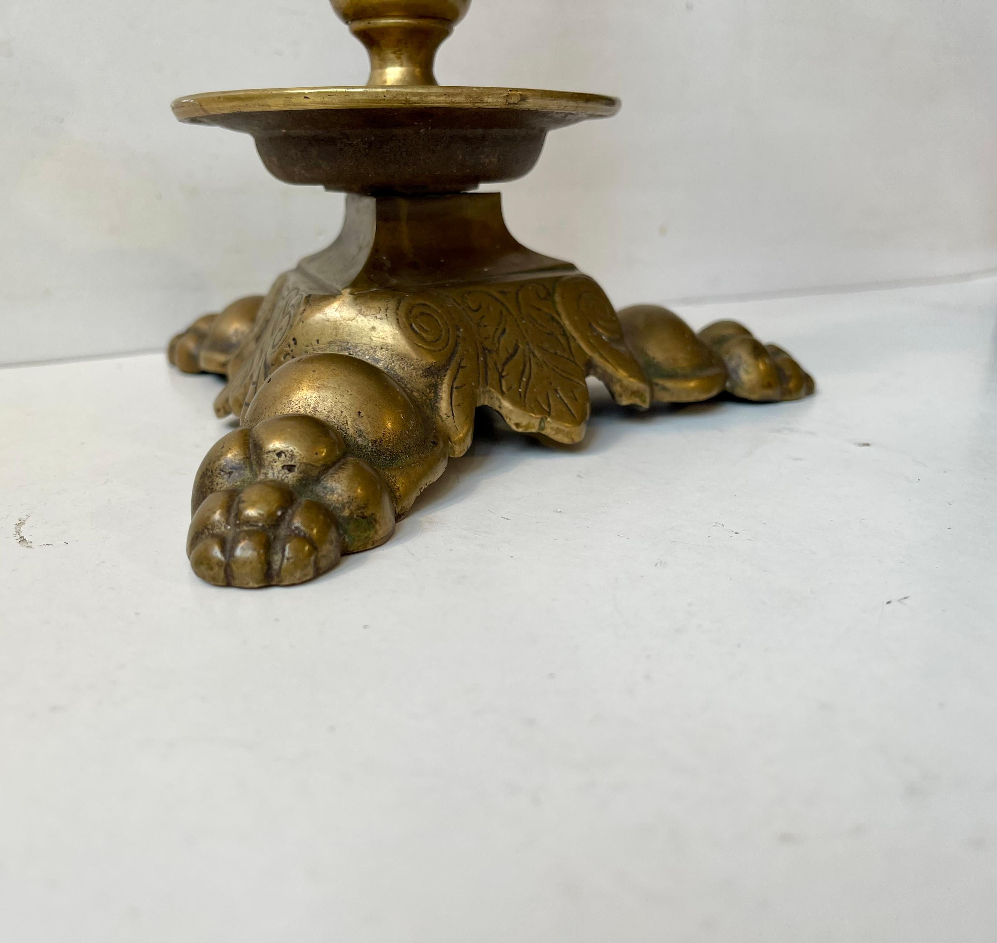 Engraved Antique Hand-engraved Brass Candleholder with Lions Feet For Sale
