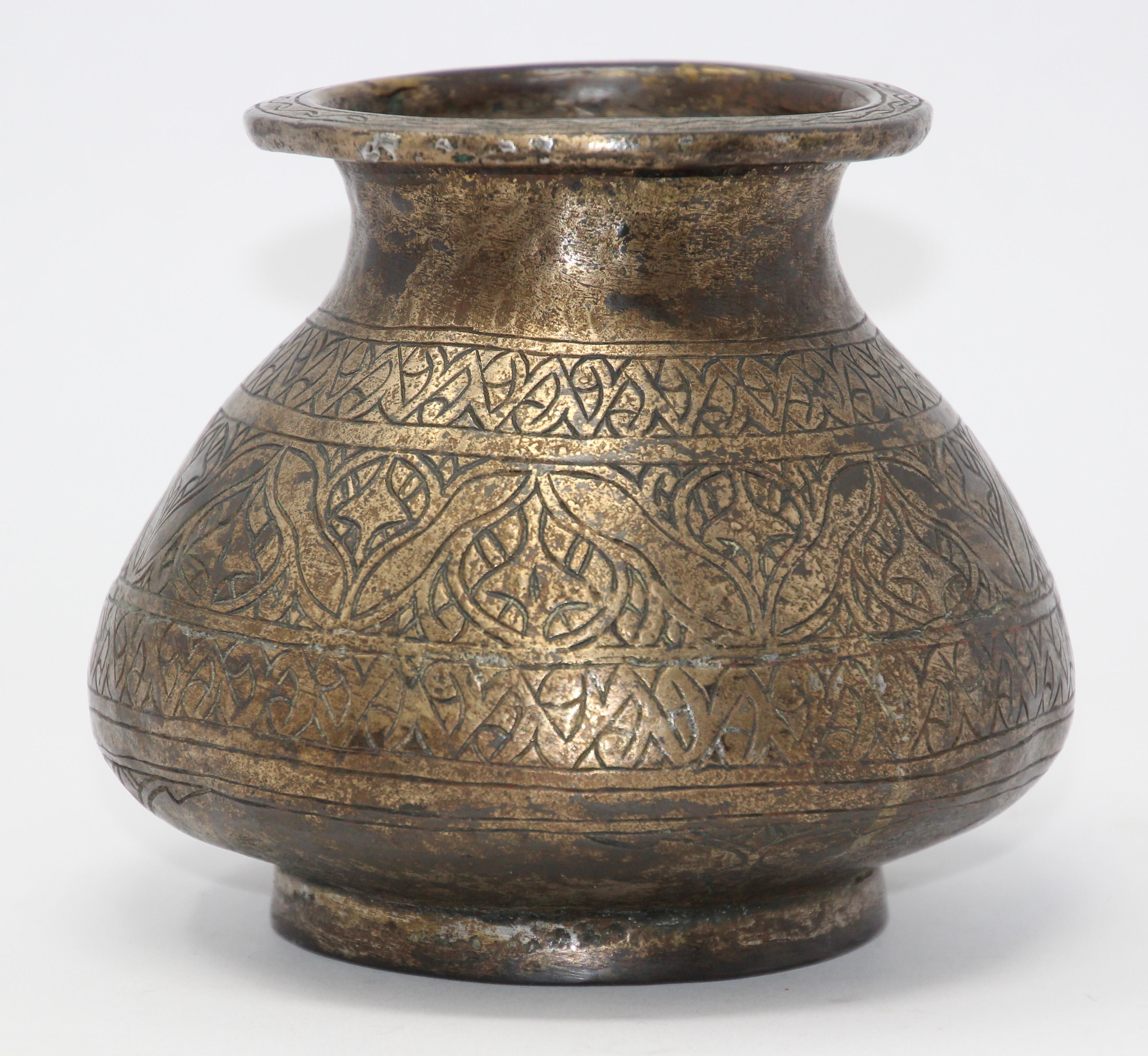 Antique hand-hammered metal bronze ceremonial pot 