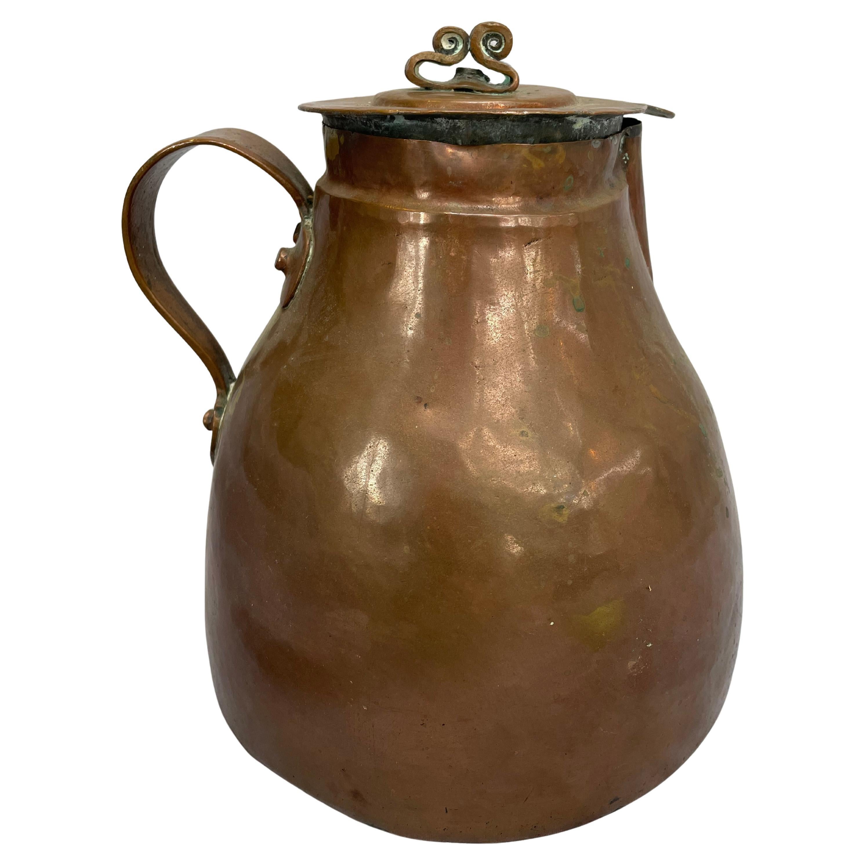 Antique hand-hammered copper pitcher For Sale