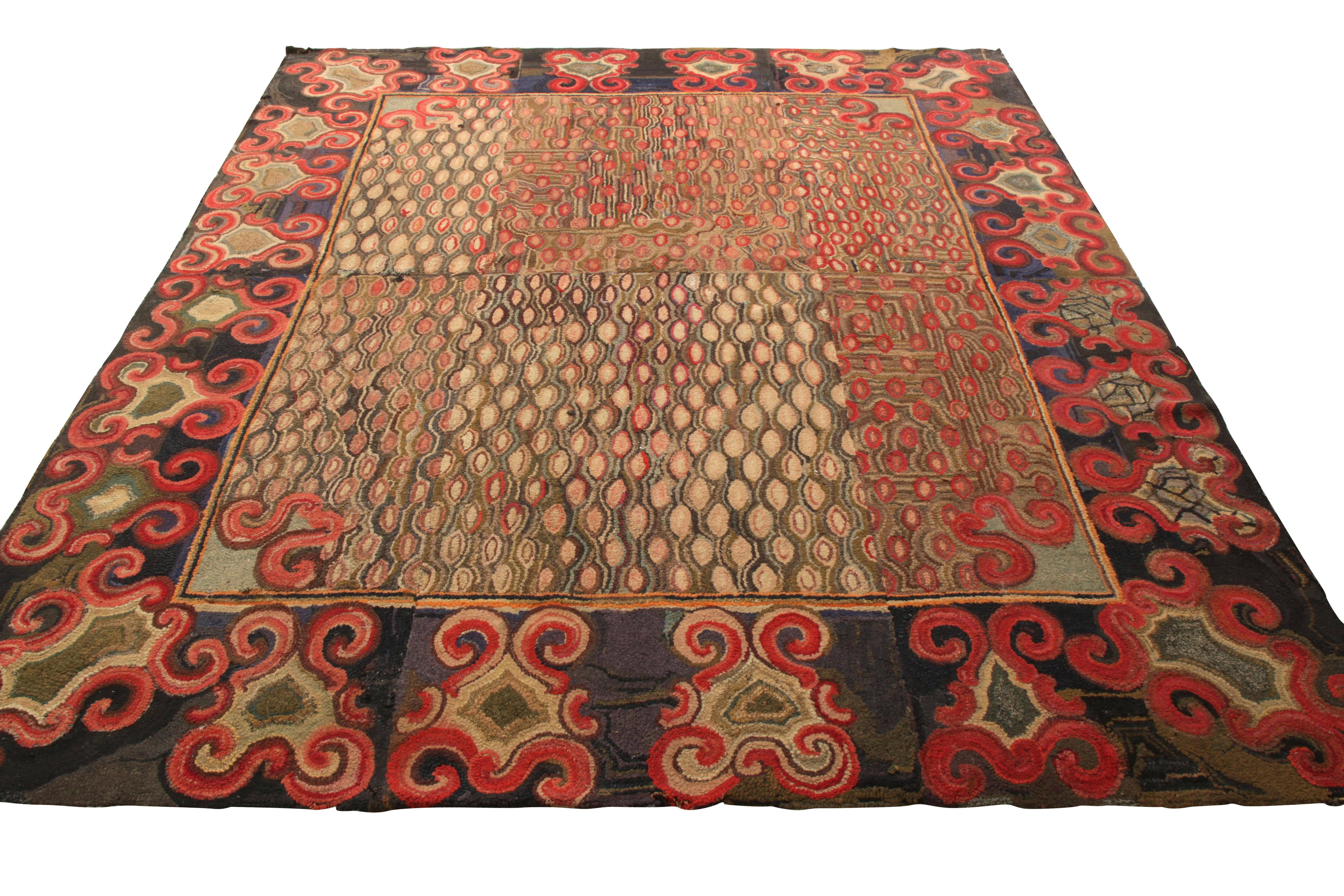 Hand hooked in wool, this very unique rug makes way to Rug & Kilim’s Antique and Vintage collection. Originating from the United States circa 1910-1920, this visually arresting 8 x 12 enjoys a unison of intricate geometric floral design with a bold