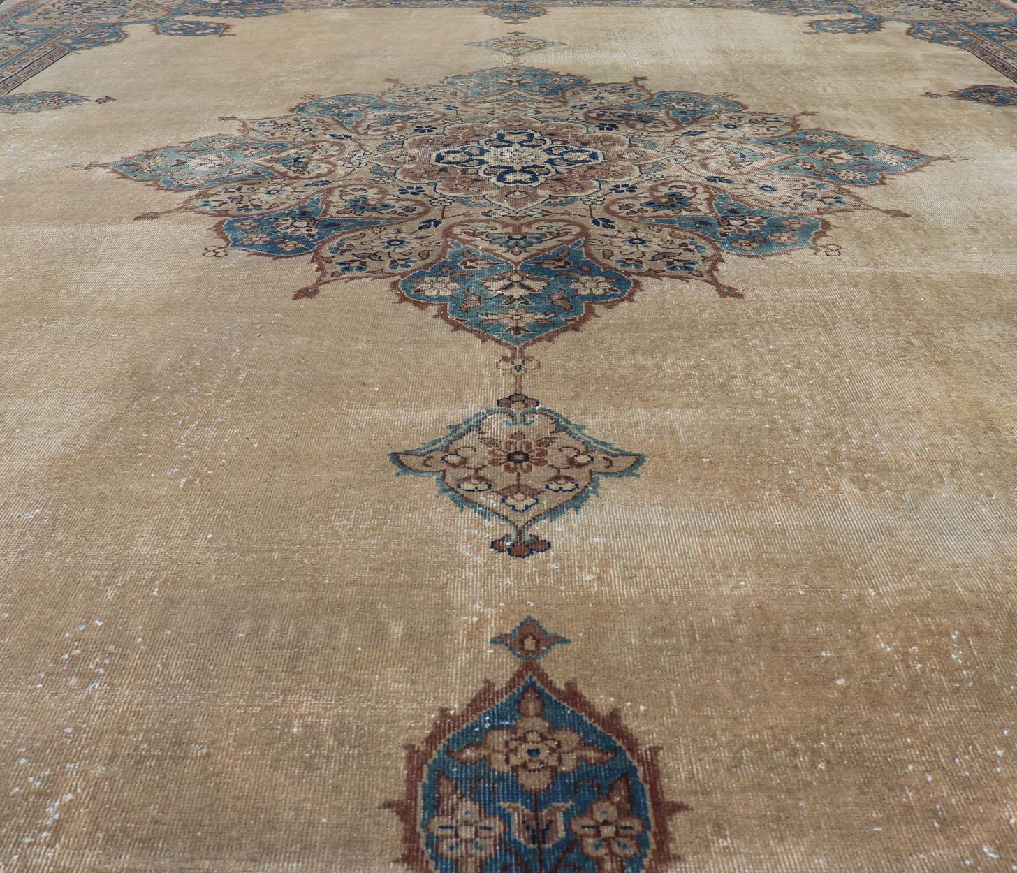 Indian Antique Hand Knotted Amritsar Carpet in Taupe, Light Brown and Blue Accent's For Sale