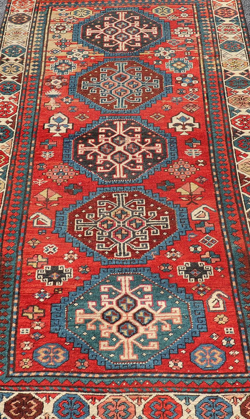 Antique Hand Knotted Caucasian Kazak Rug in Brilliant Red with Geometric Design In Good Condition For Sale In Atlanta, GA