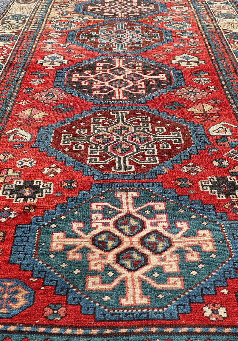 Late 19th Century Antique Hand Knotted Caucasian Kazak Rug in Brilliant Red with Geometric Design For Sale
