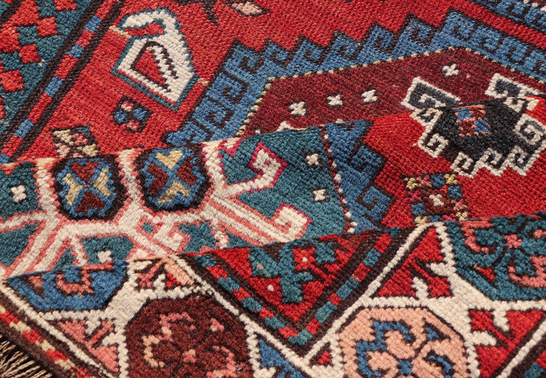 Antique Hand Knotted Caucasian Kazak Rug in Brilliant Red with Geometric Design For Sale 3