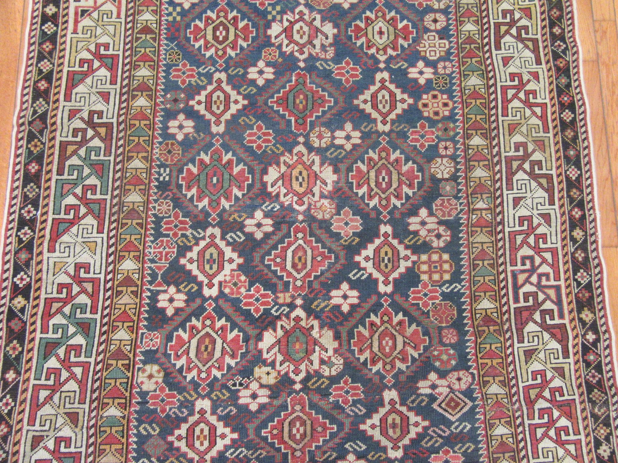 Hand-Knotted Antique Hand Knotted Gallery Size Caucasian Rug For Sale