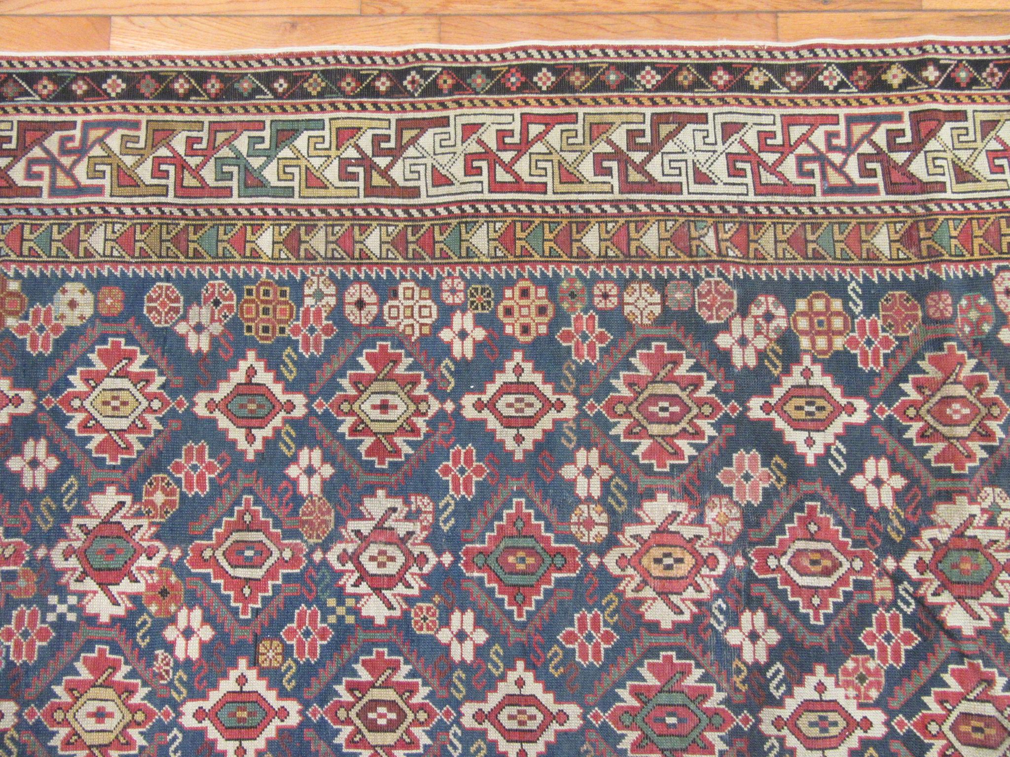 20th Century Antique Hand Knotted Gallery Size Caucasian Rug For Sale